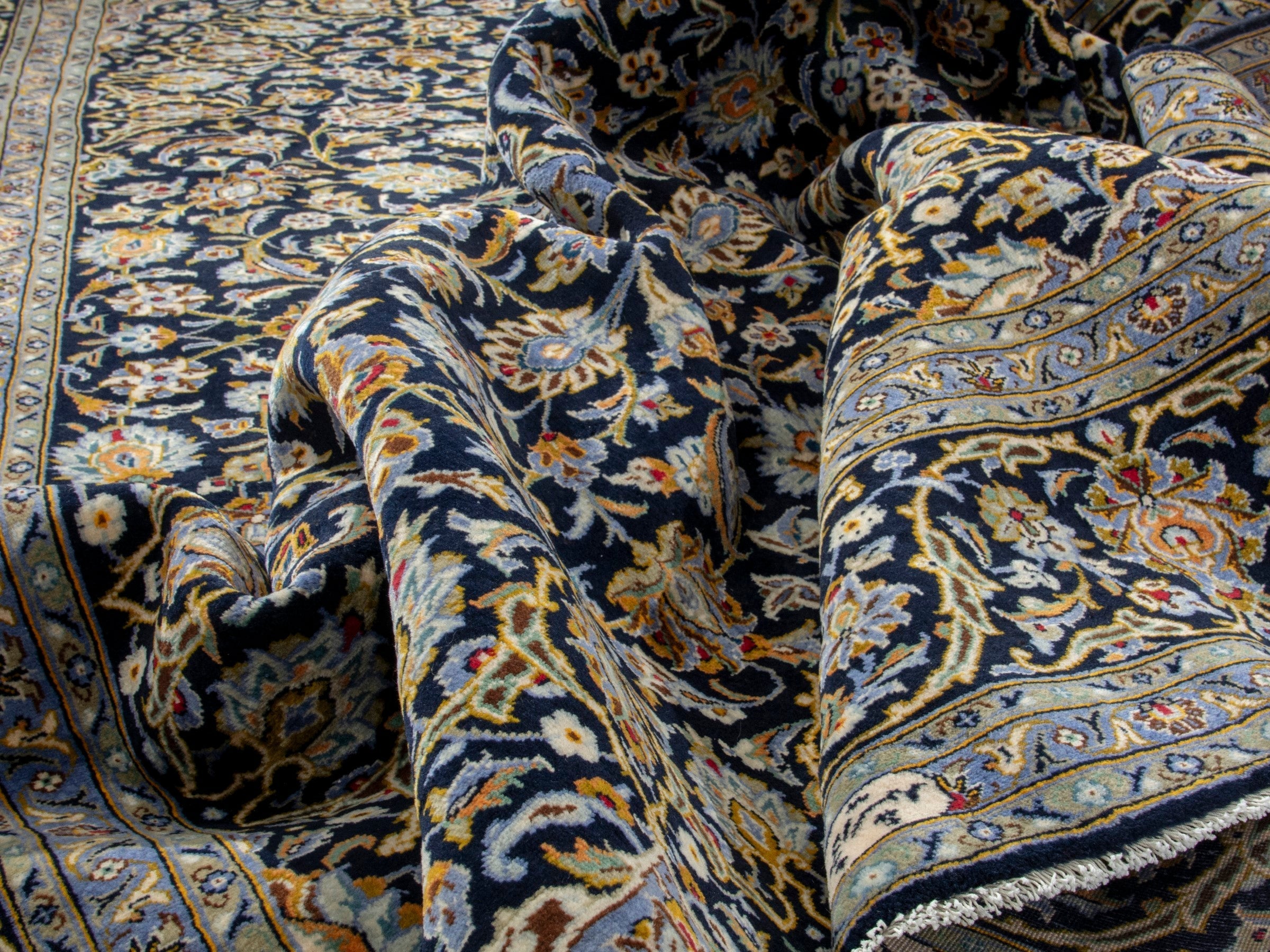 Persian Kashan oversized rug in navy and tan, view 19 of 20