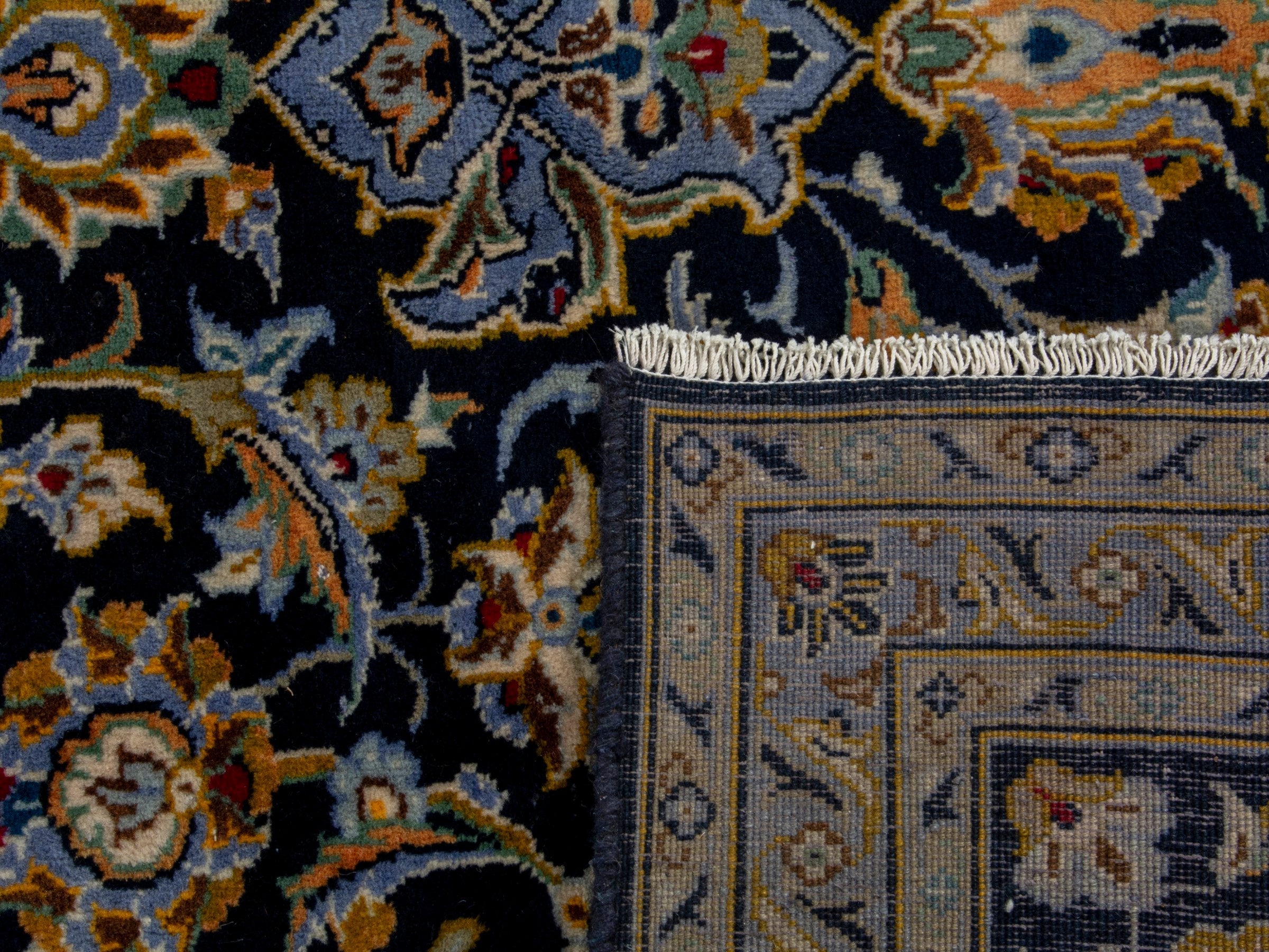 Persian Kashan oversized rug in navy and tan, view 20 of 20