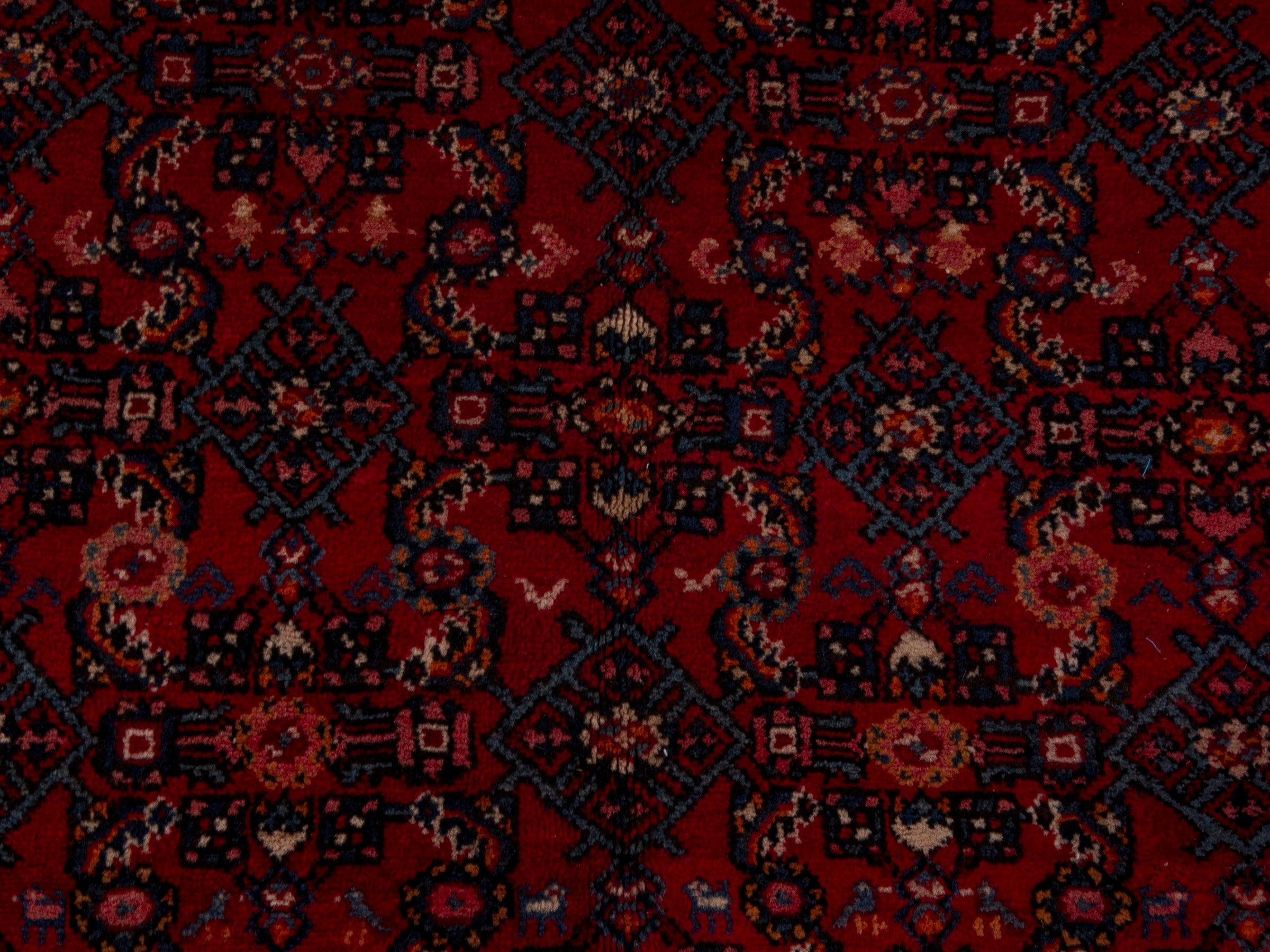 Persian Hosseinabad oversized rug in burgundy and navy, view 12 of 19
