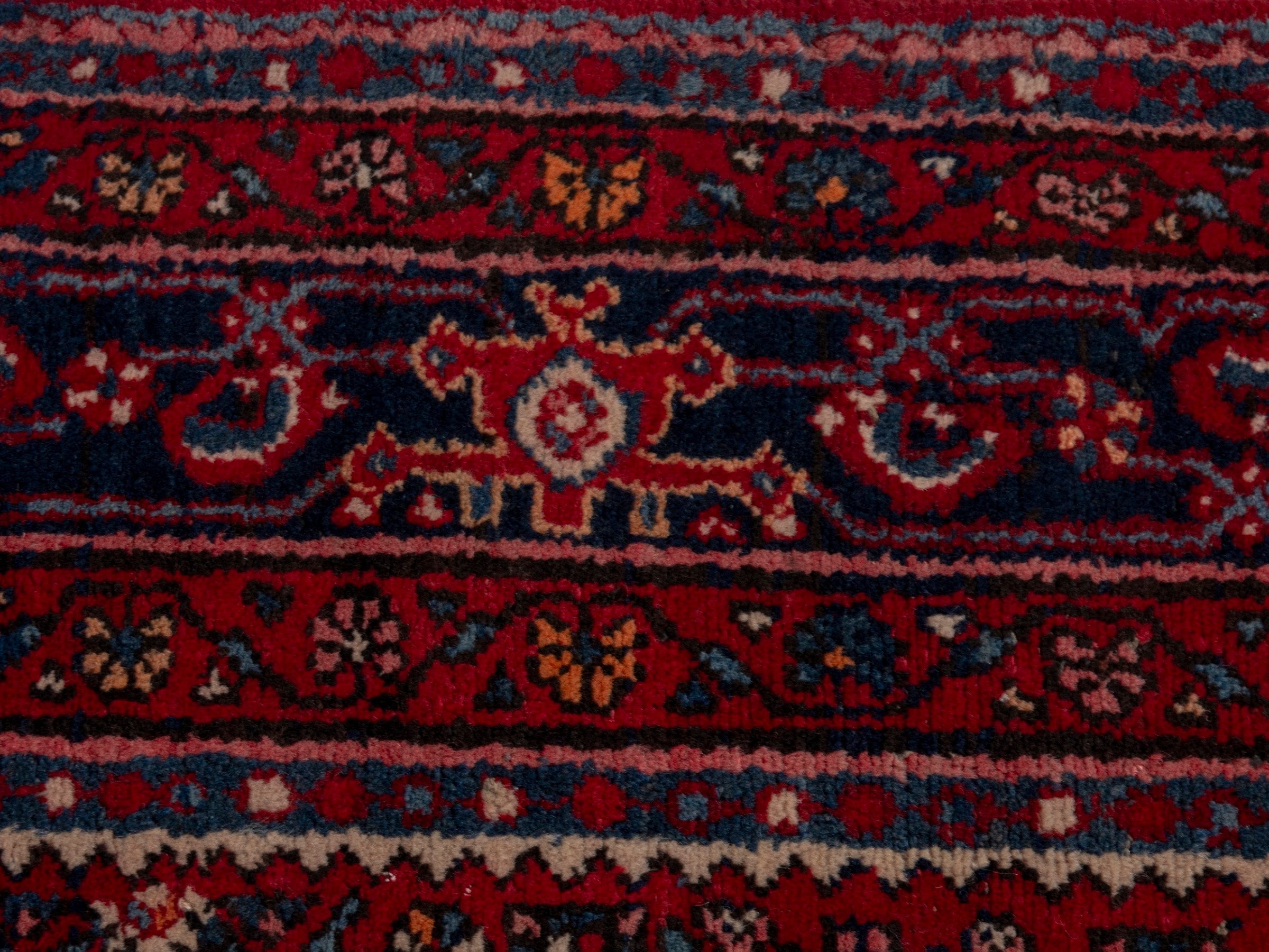 Persian Hosseinabad oversized rug in burgundy and navy, view 14 of 19