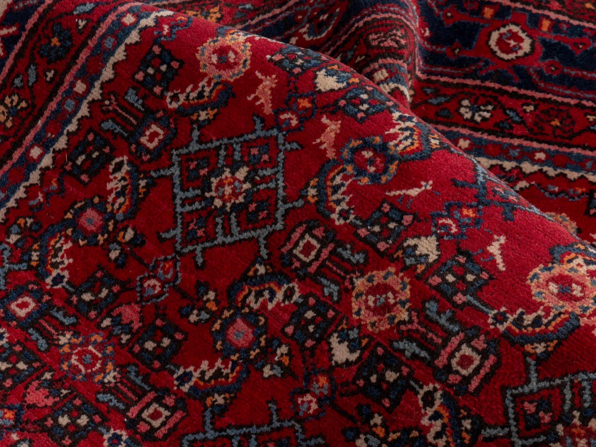 Persian Hosseinabad oversized rug in burgundy and navy, view 16 of 19