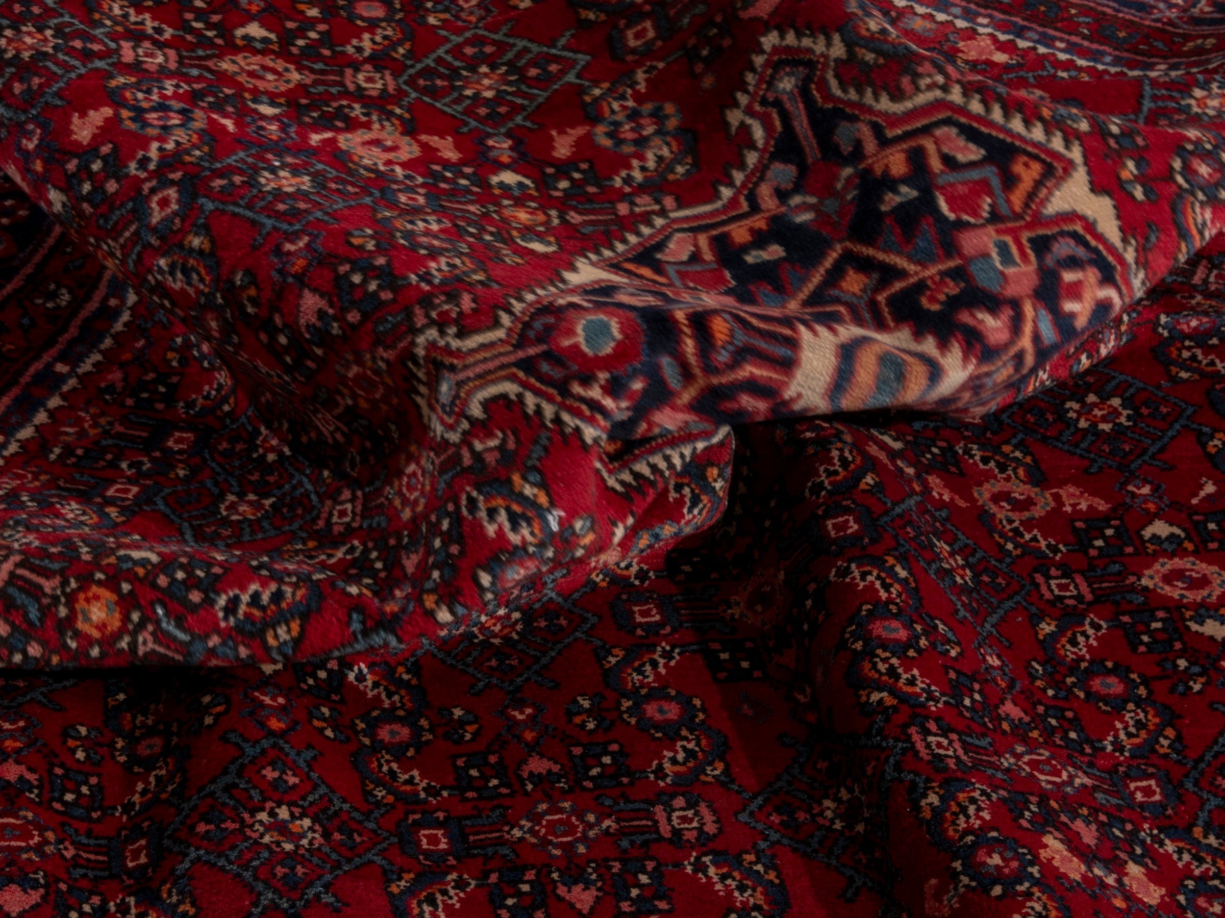 Persian Hosseinabad oversized rug in burgundy and navy, view 18 of 19