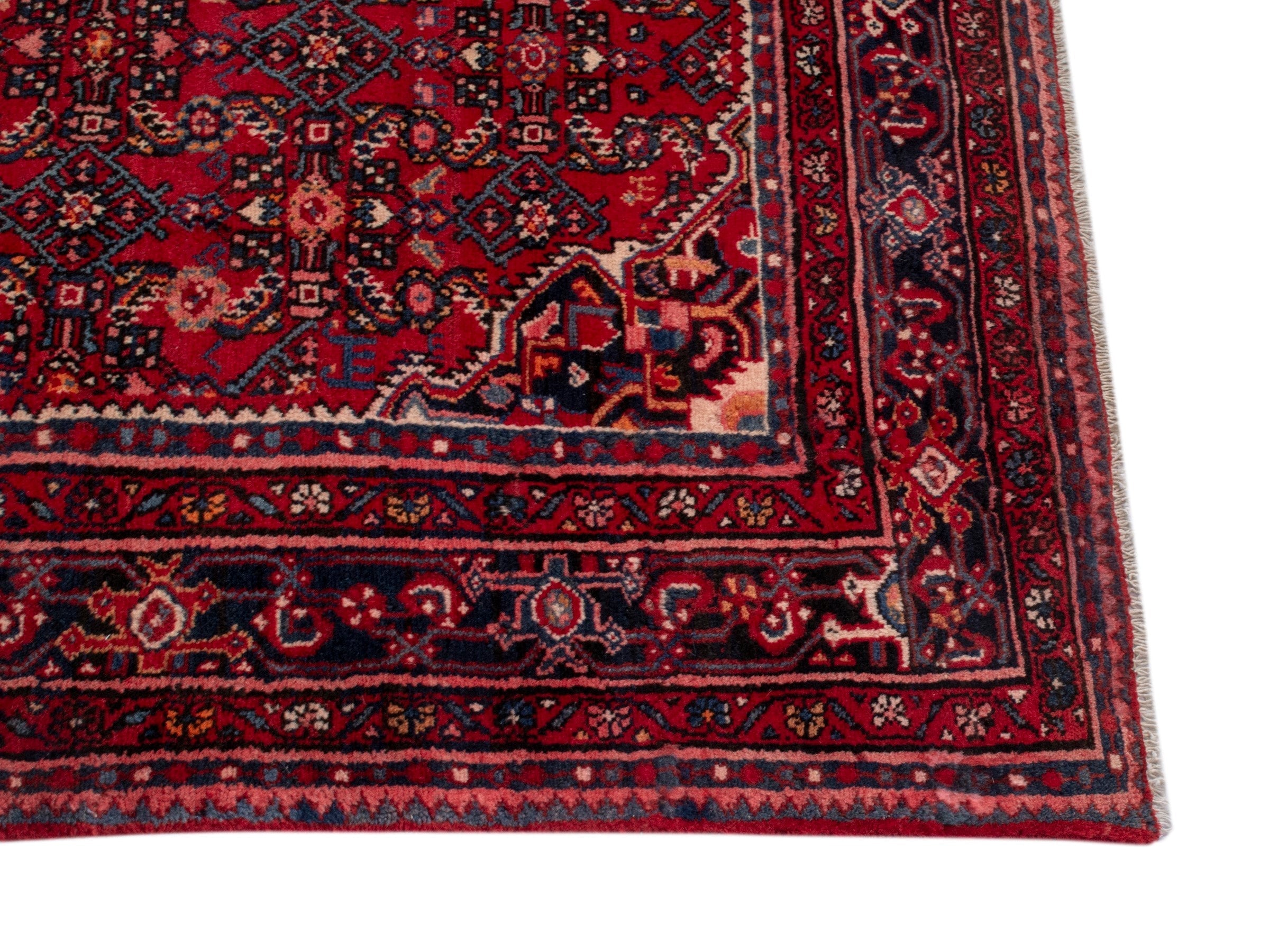 Persian Hosseinabad oversized rug in burgundy and navy, view 10 of 19
