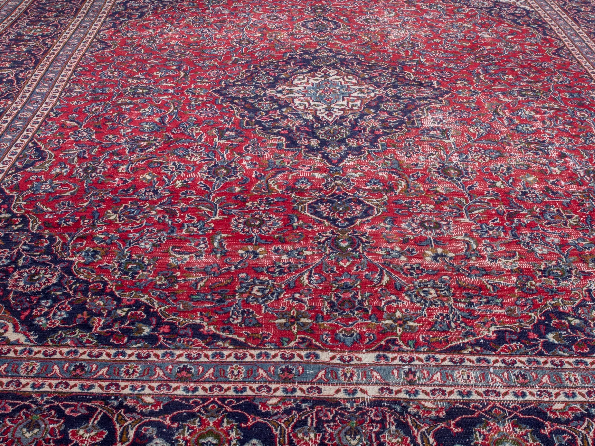 Persian Mashhad oversized rug in burgundy and navy, view 8 of 22