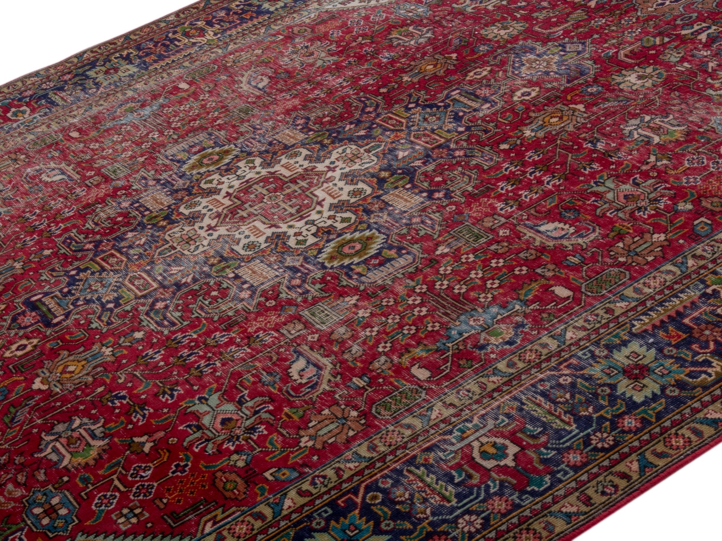 Persian Tabriz oversized rug in deep red and navy, view 4 of 26