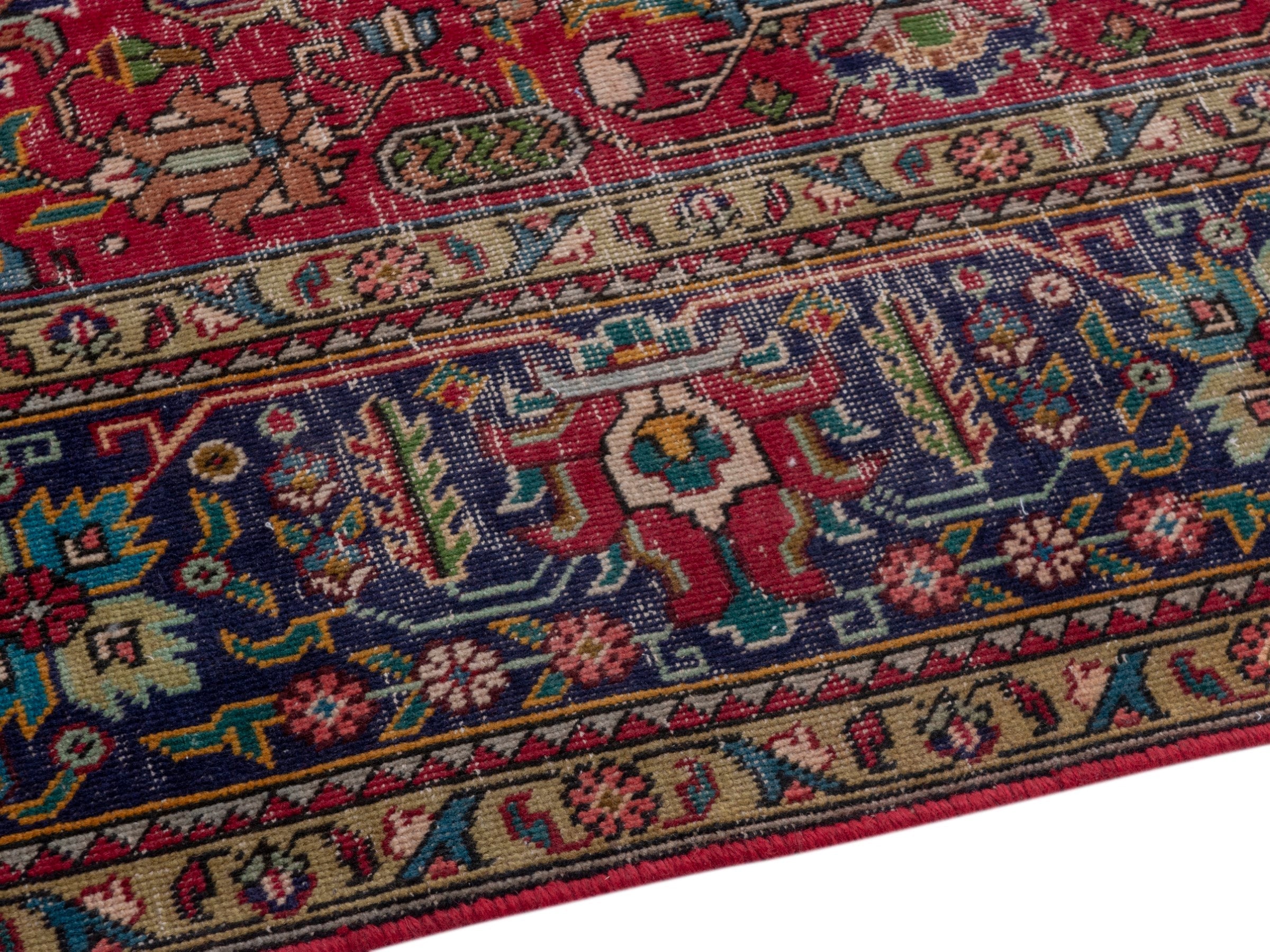 Persian Tabriz oversized rug in deep red and navy, view 6 of 26