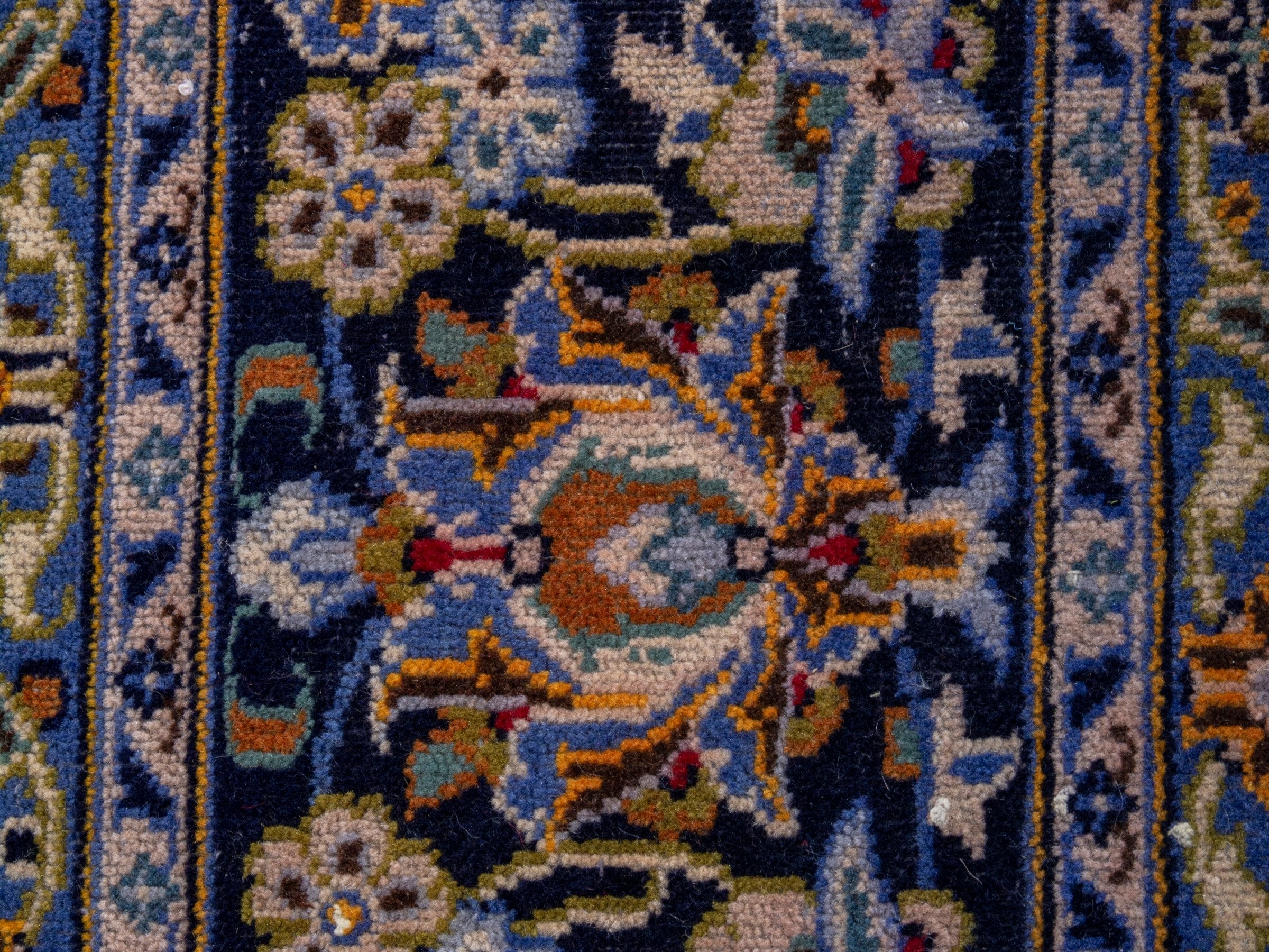 Persian Kashan oversized rug in navy and tan, view 11 of 19