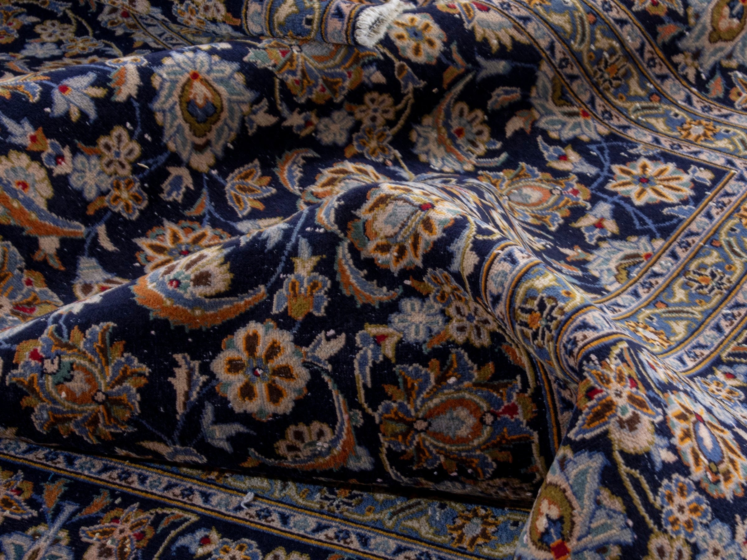 Persian Kashan oversized rug in navy and tan, view 14 of 19
