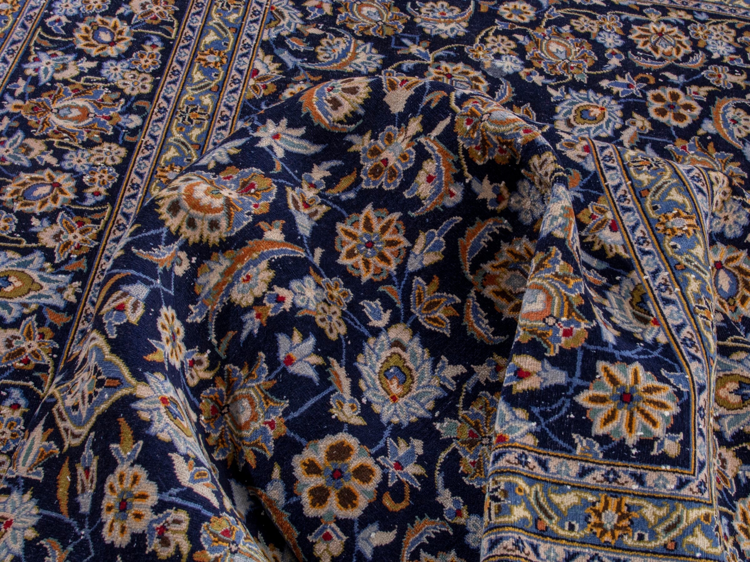 Persian Kashan oversized rug in navy and tan, view 15 of 19