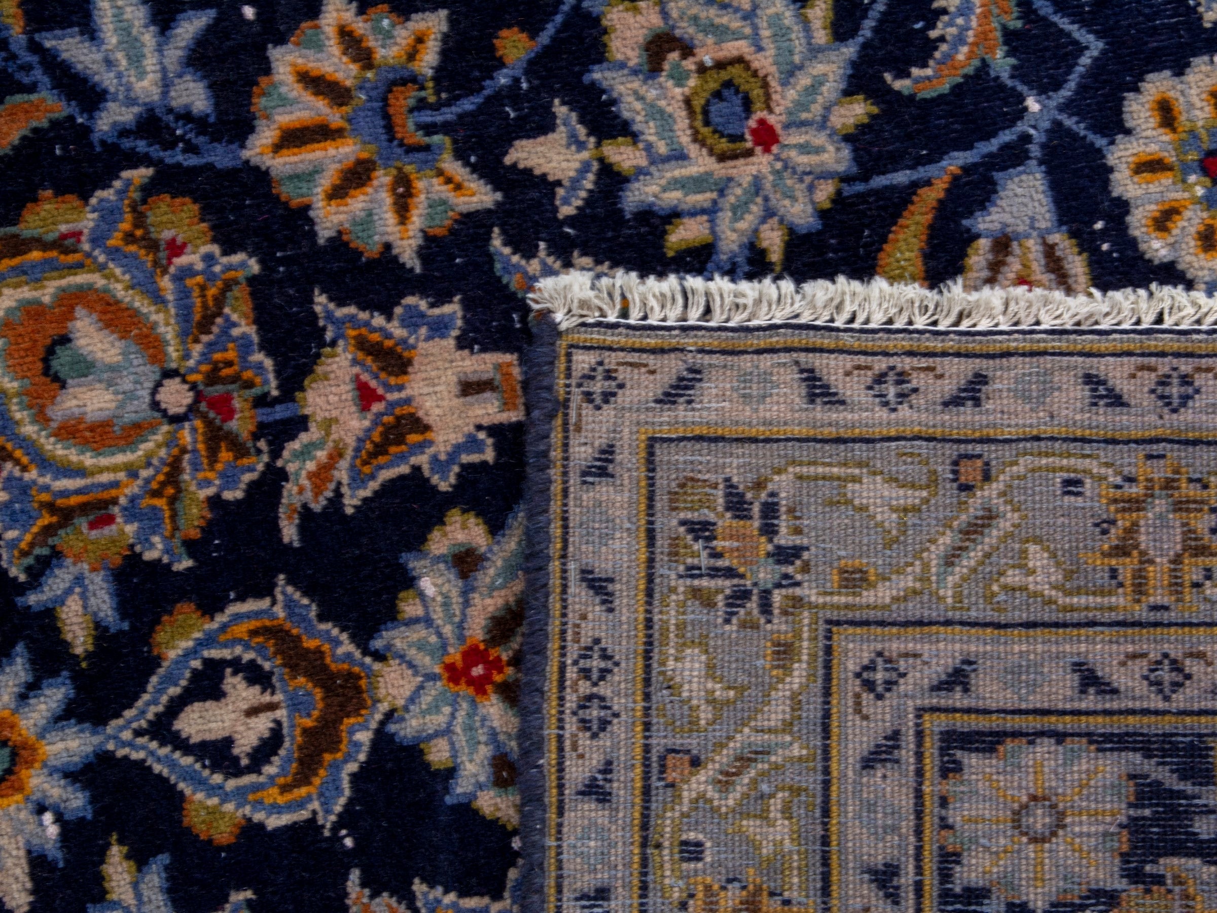 Persian Kashan oversized rug in navy and tan, view 19 of 19