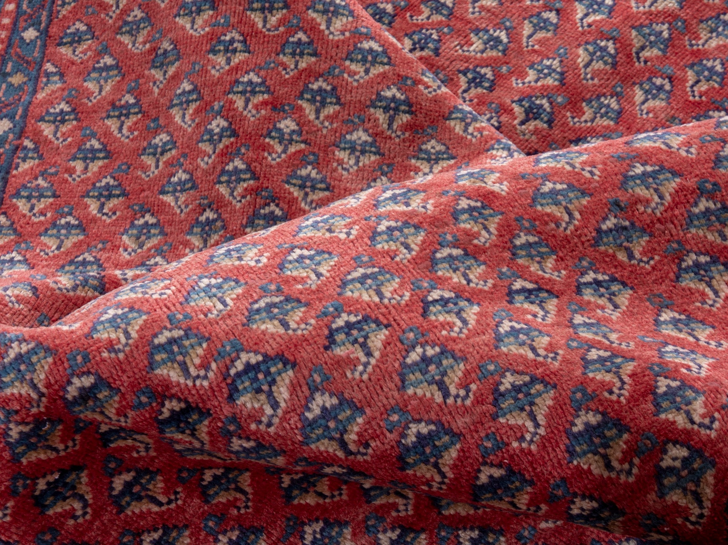 Persian Arak area rug in deep red and navy, view 17 of 20