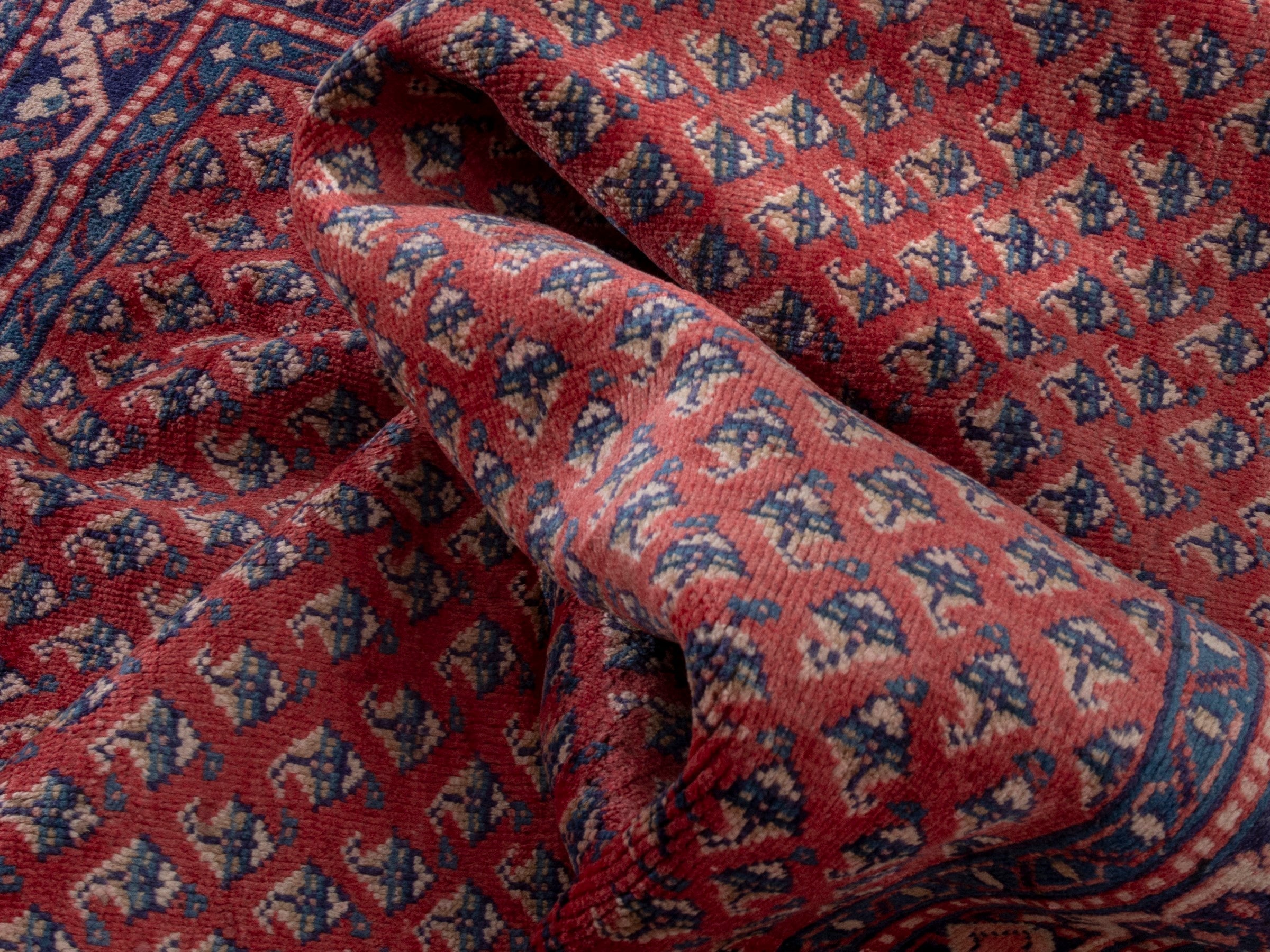 Persian Arak area rug in deep red and navy, view 18 of 20