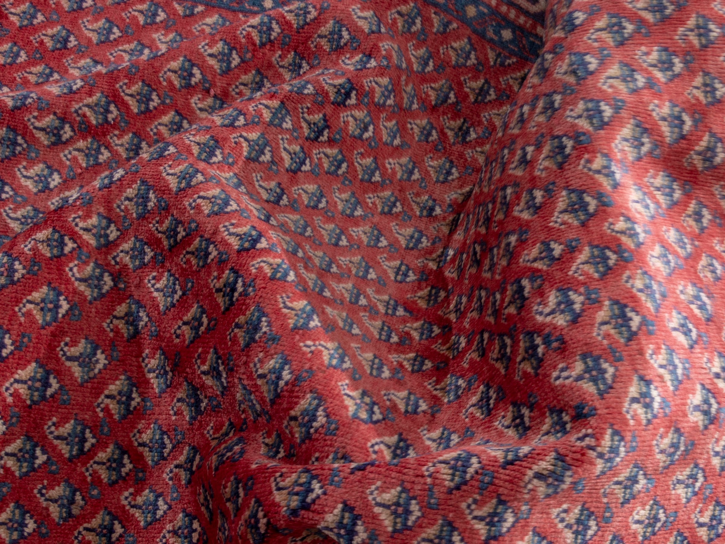 Persian Arak area rug in deep red and navy, view 19 of 20