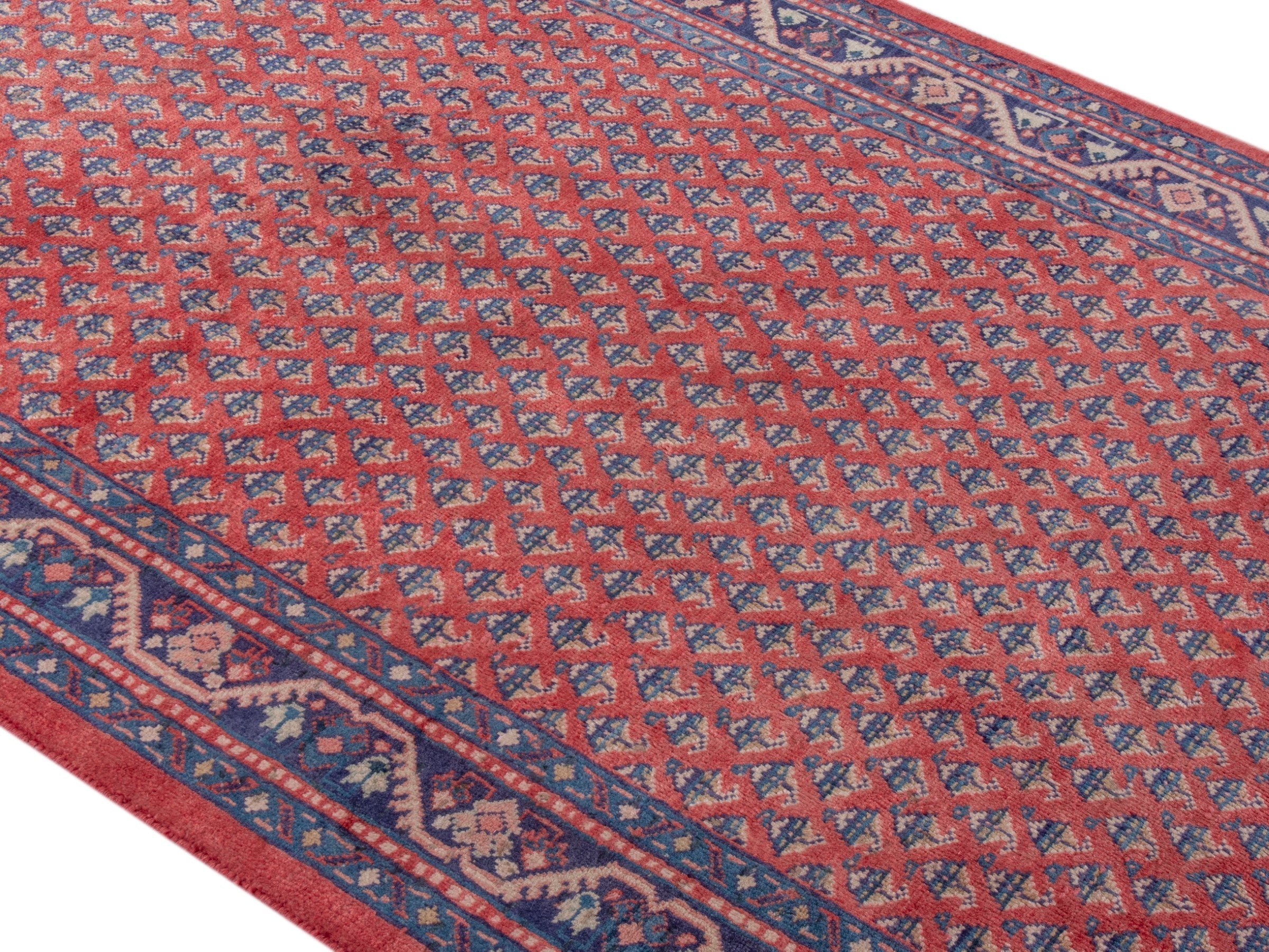 Persian Arak area rug in deep red and navy, view 4 of 20