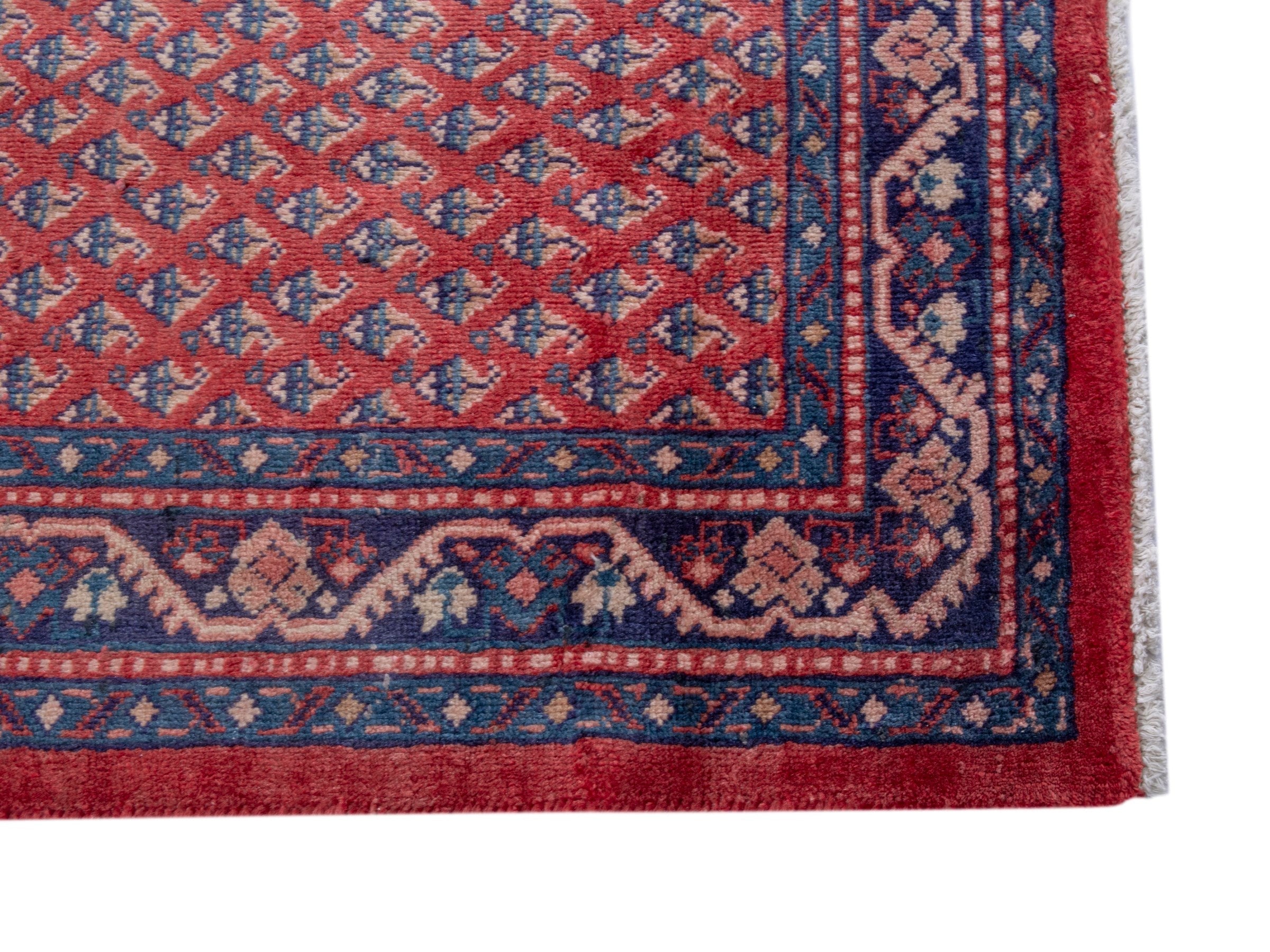 Persian Arak area rug in deep red and navy, view 10 of 20