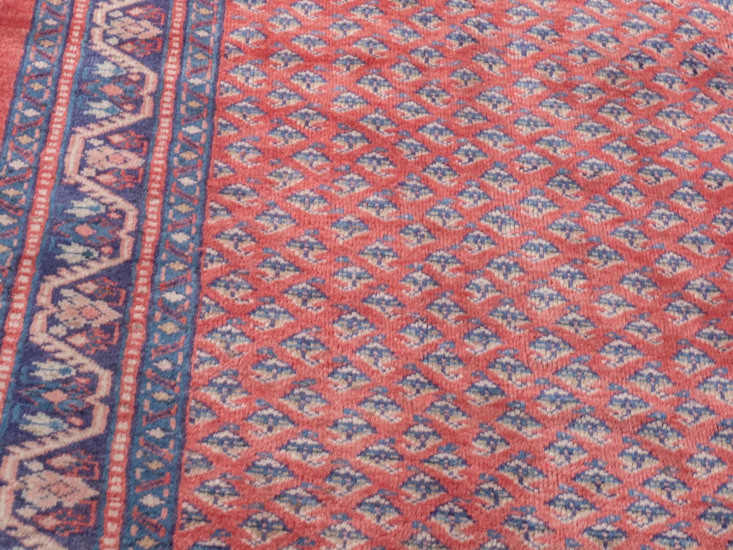 Persian Arak area rug in deep red and navy, view 9 of 20
