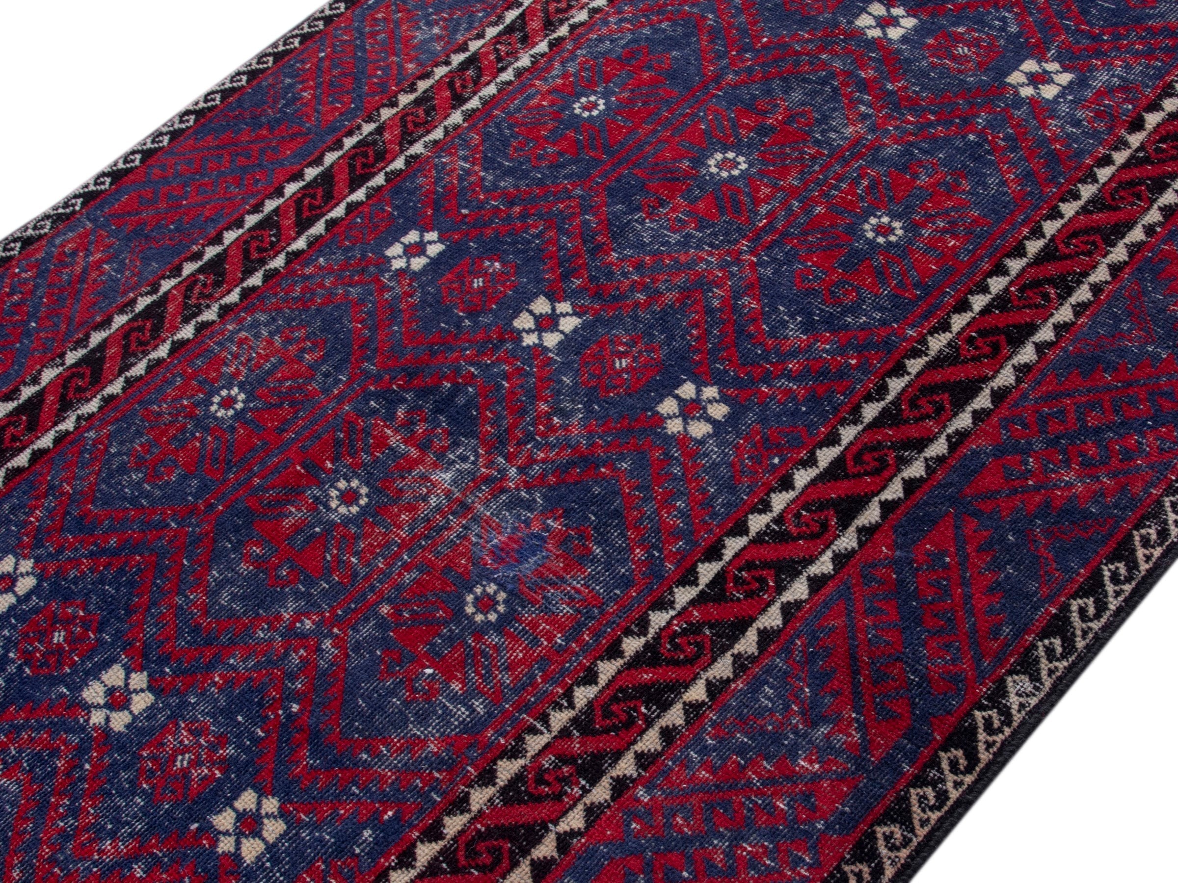 Persian Baluch area rug in burgundy and deep red, view 4 of 19