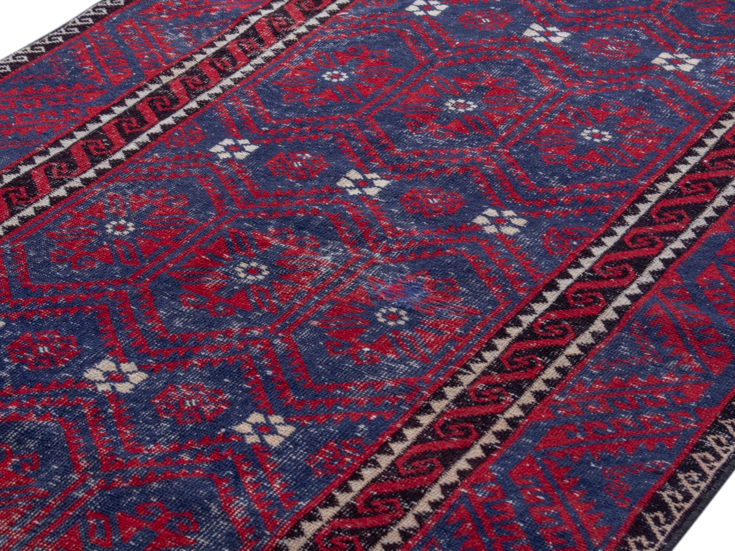 Persian Baluch area rug in burgundy and deep red, view 7 of 19