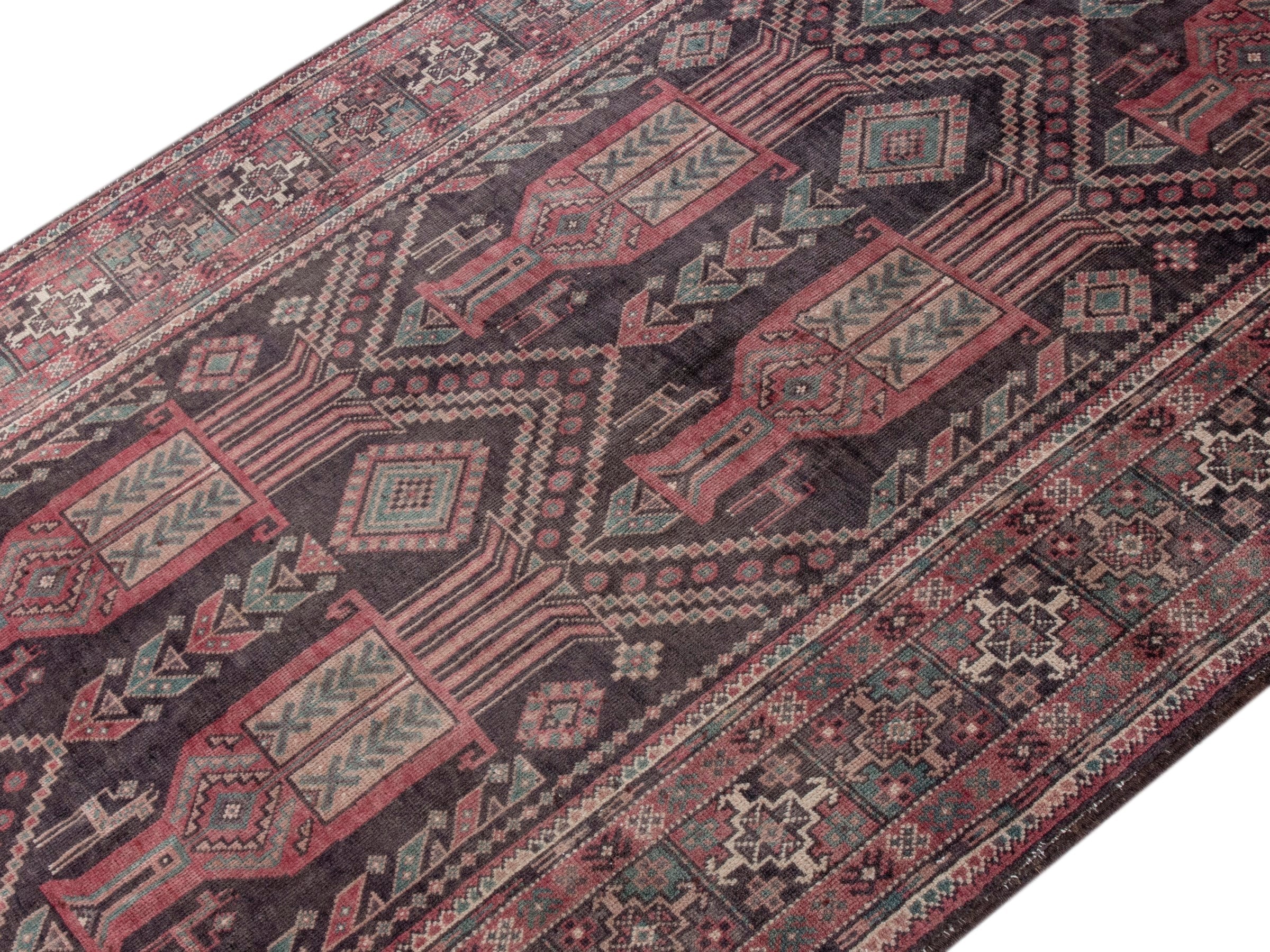 Persian Baluch area rug in burgundy and terracotta, view 4 of 18