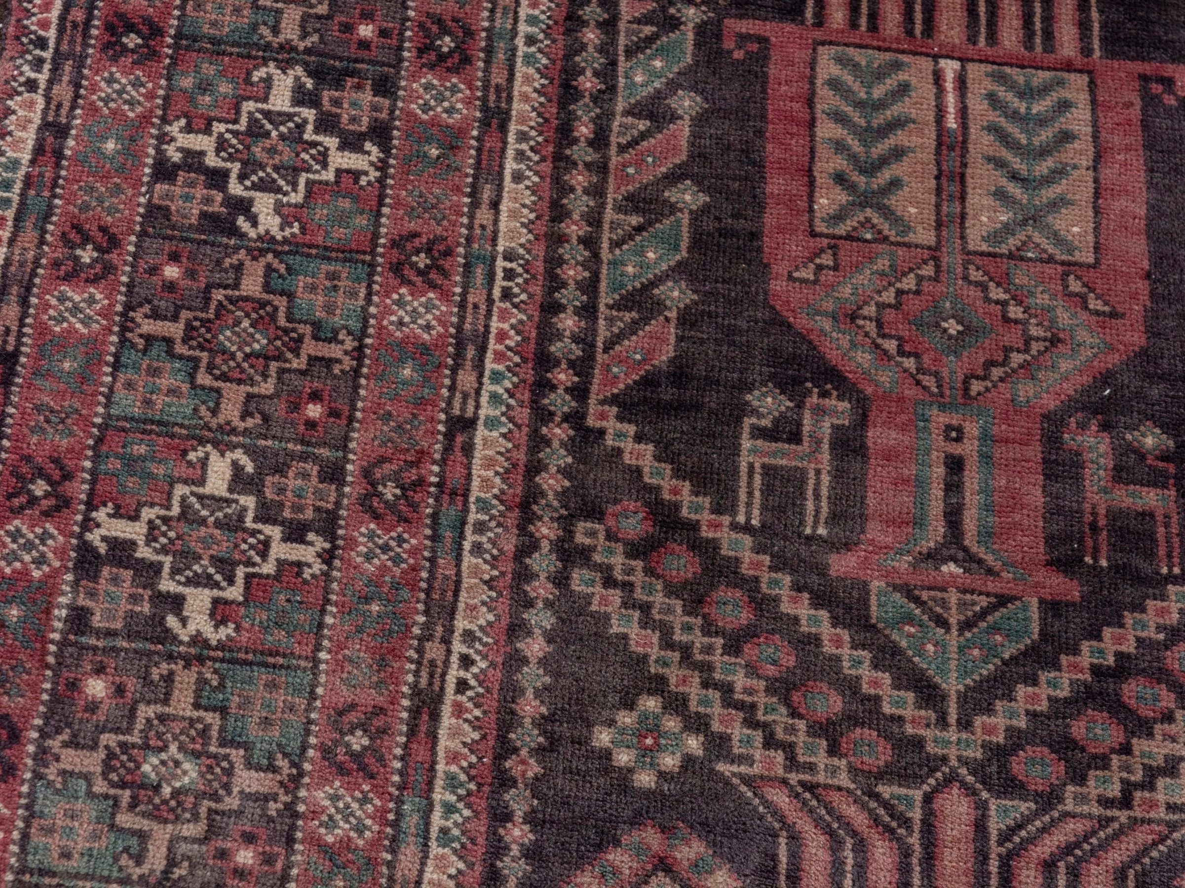 Persian Baluch area rug in burgundy and terracotta, view 9 of 18