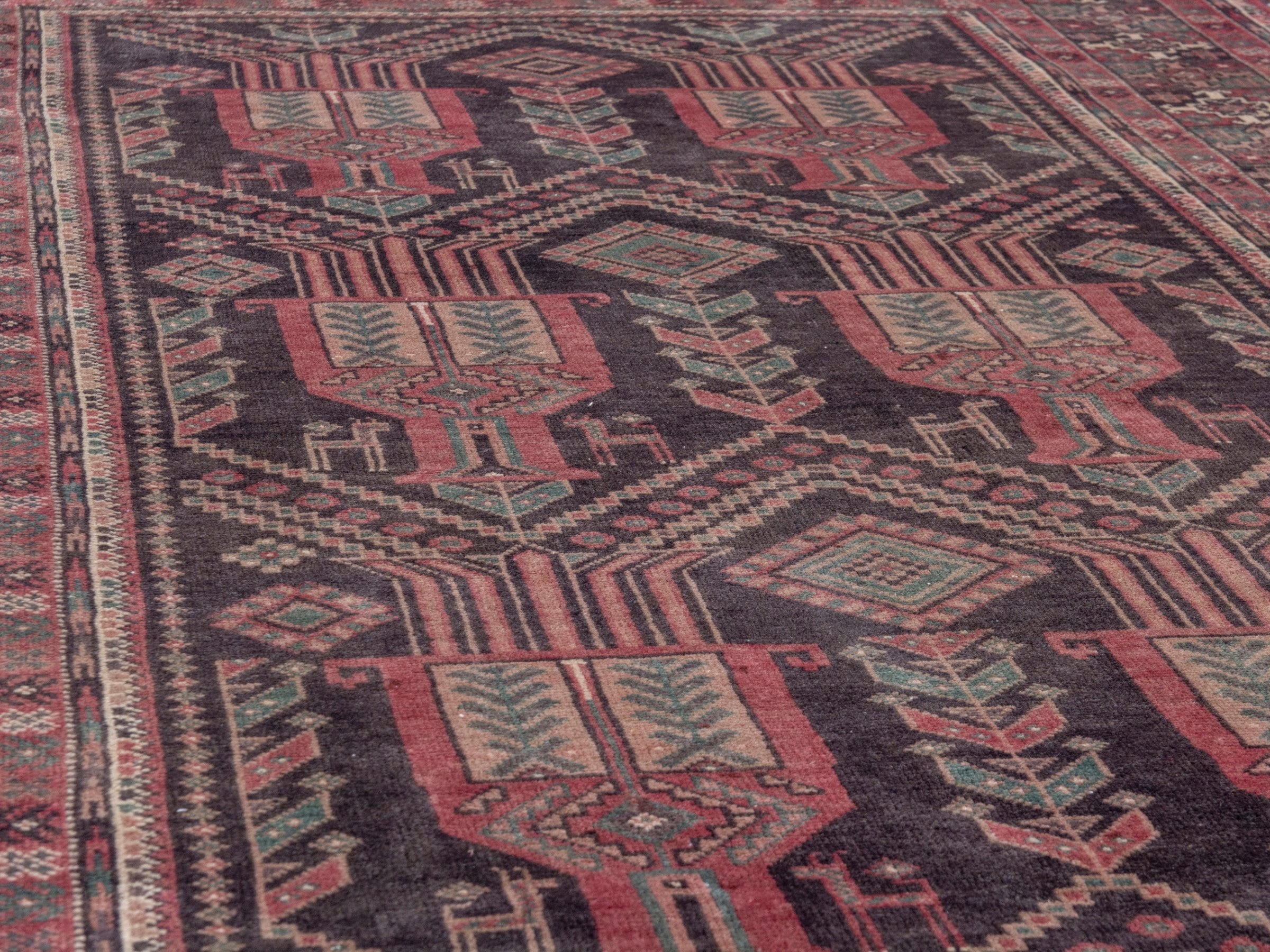Persian Baluch area rug in burgundy and terracotta, view 7 of 18