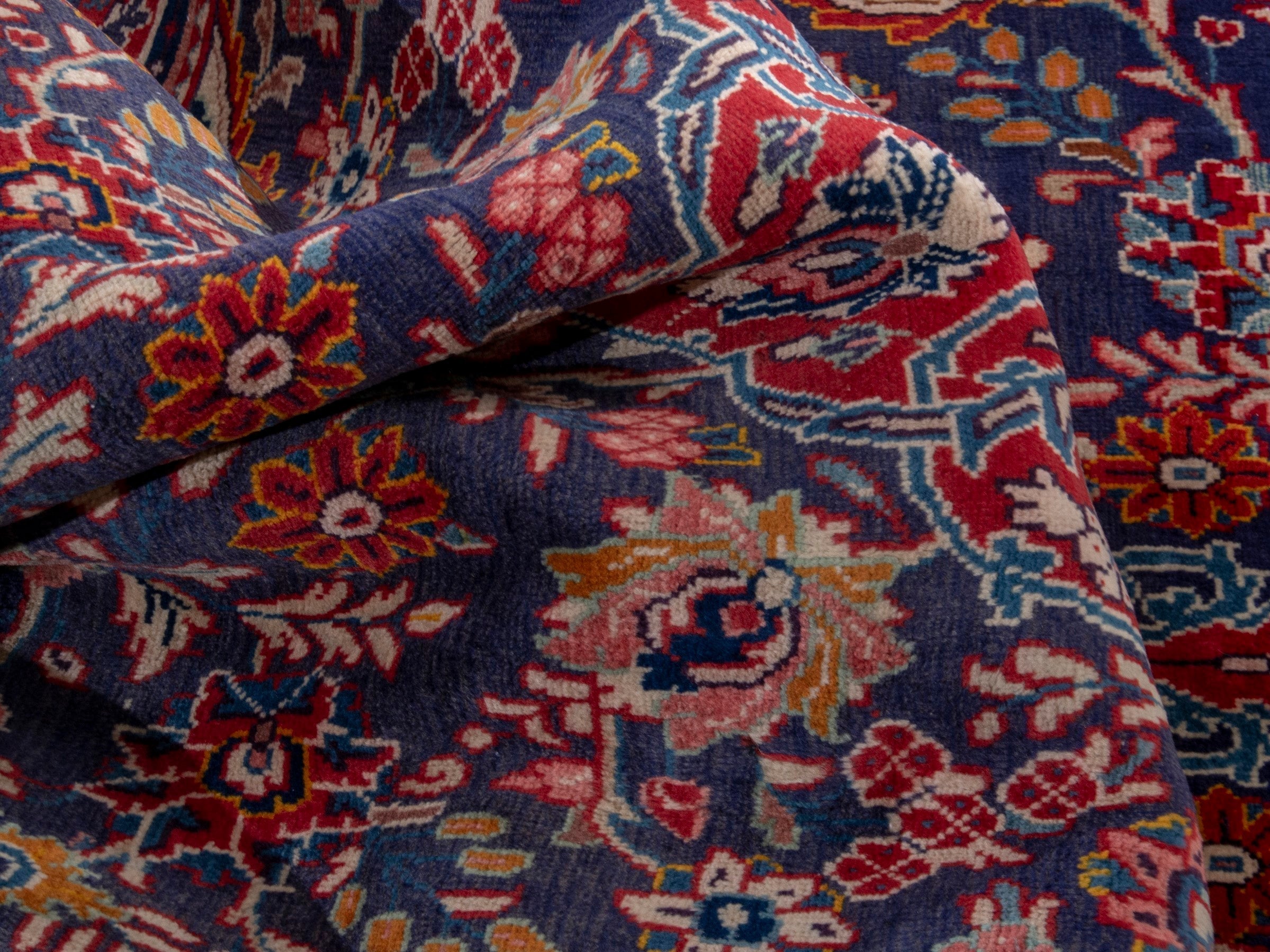 Persian Mahal area rug in navy and deep red, view 18 of 21