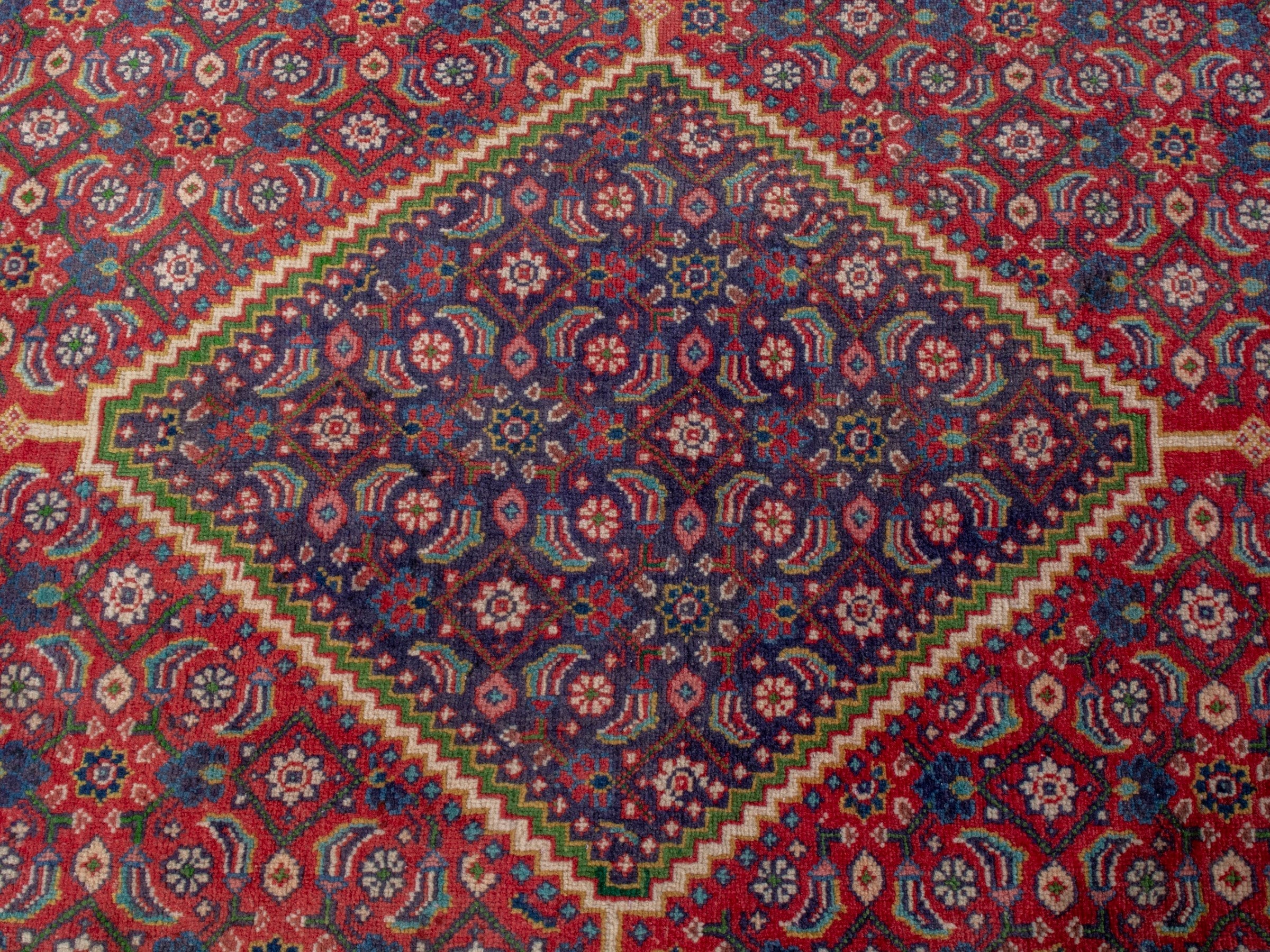 Persian Mahal area rug in rust and plum, view 13 of 19