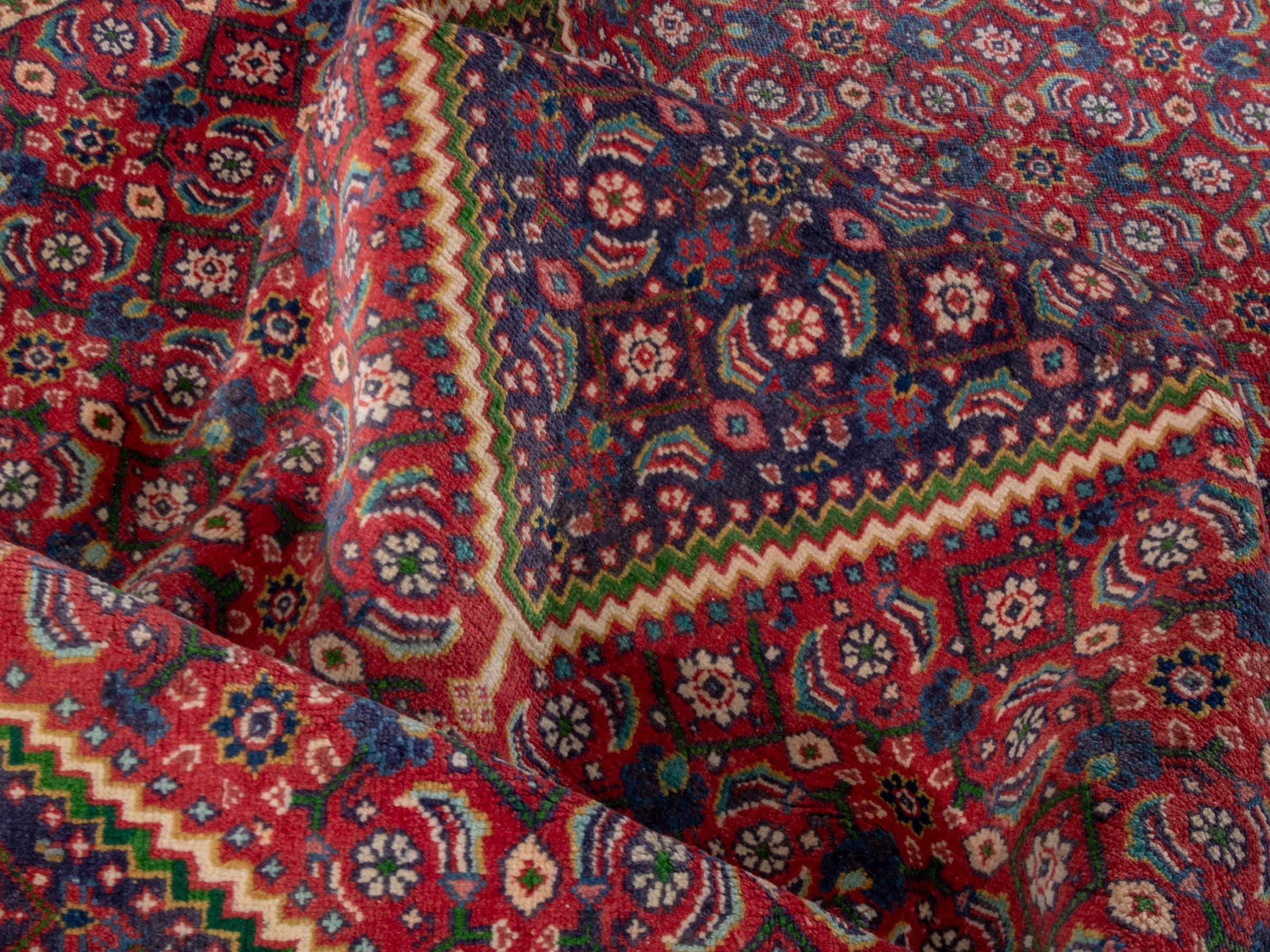 Persian Mahal area rug in rust and plum, view 15 of 19
