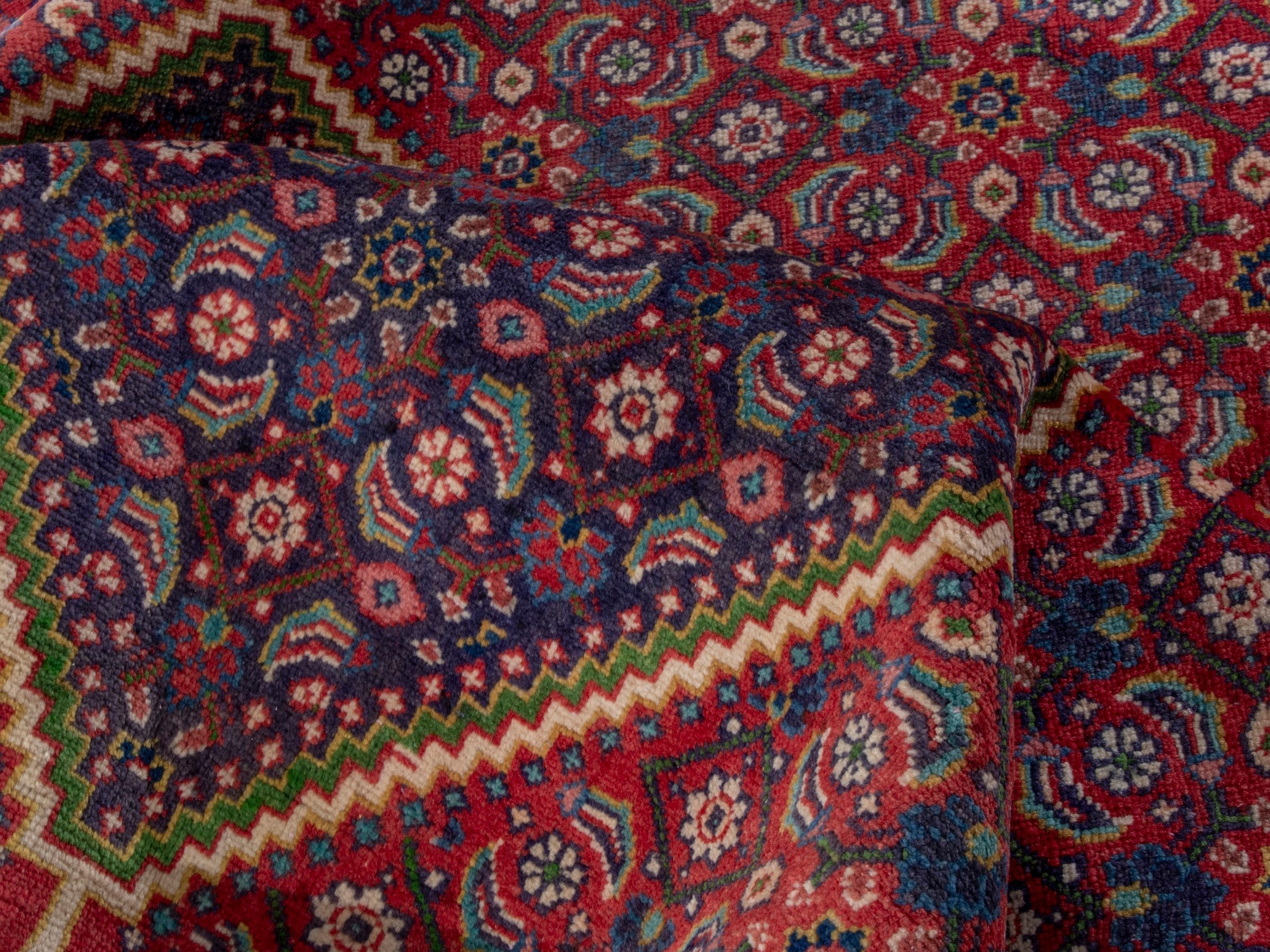 Persian Mahal area rug in rust and plum, view 16 of 19