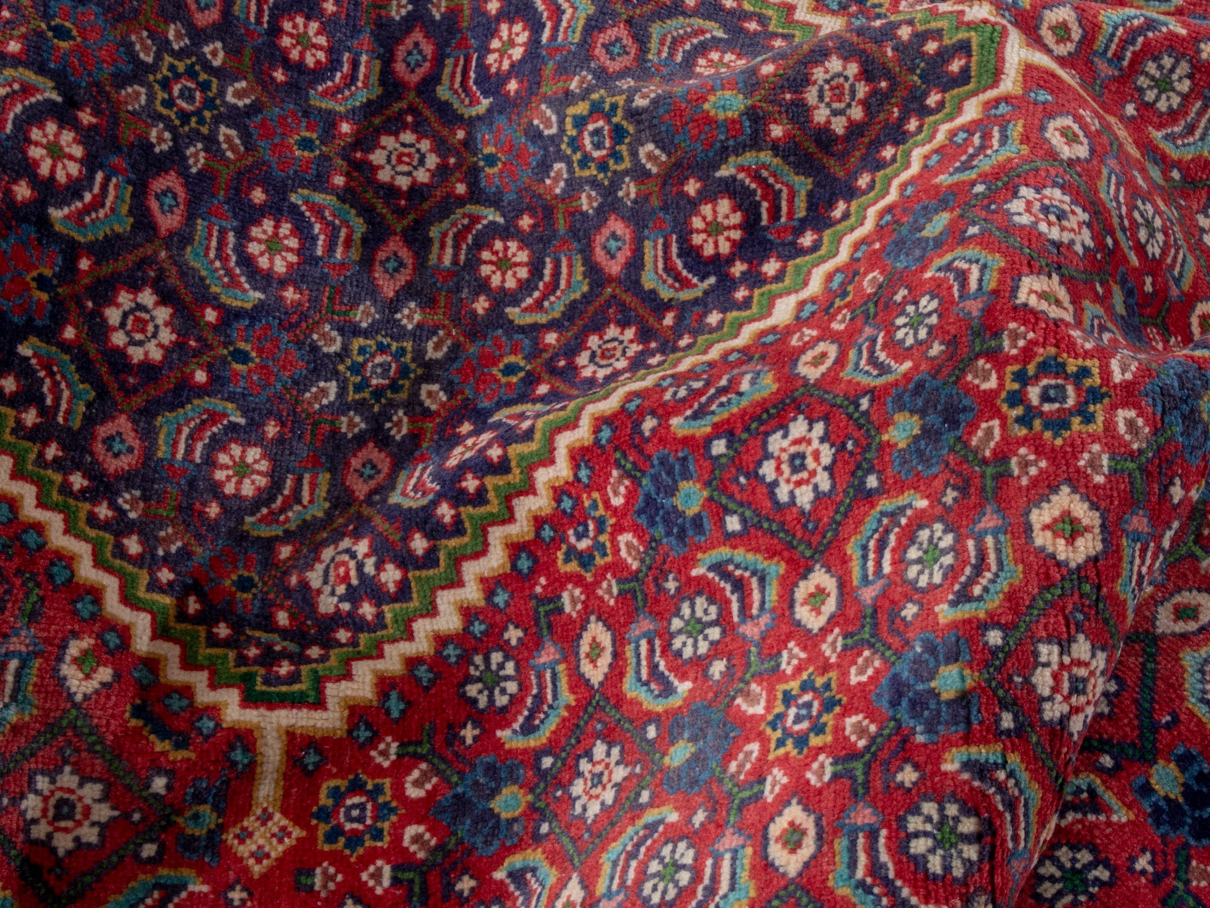 Persian Mahal area rug in rust and plum, view 17 of 19