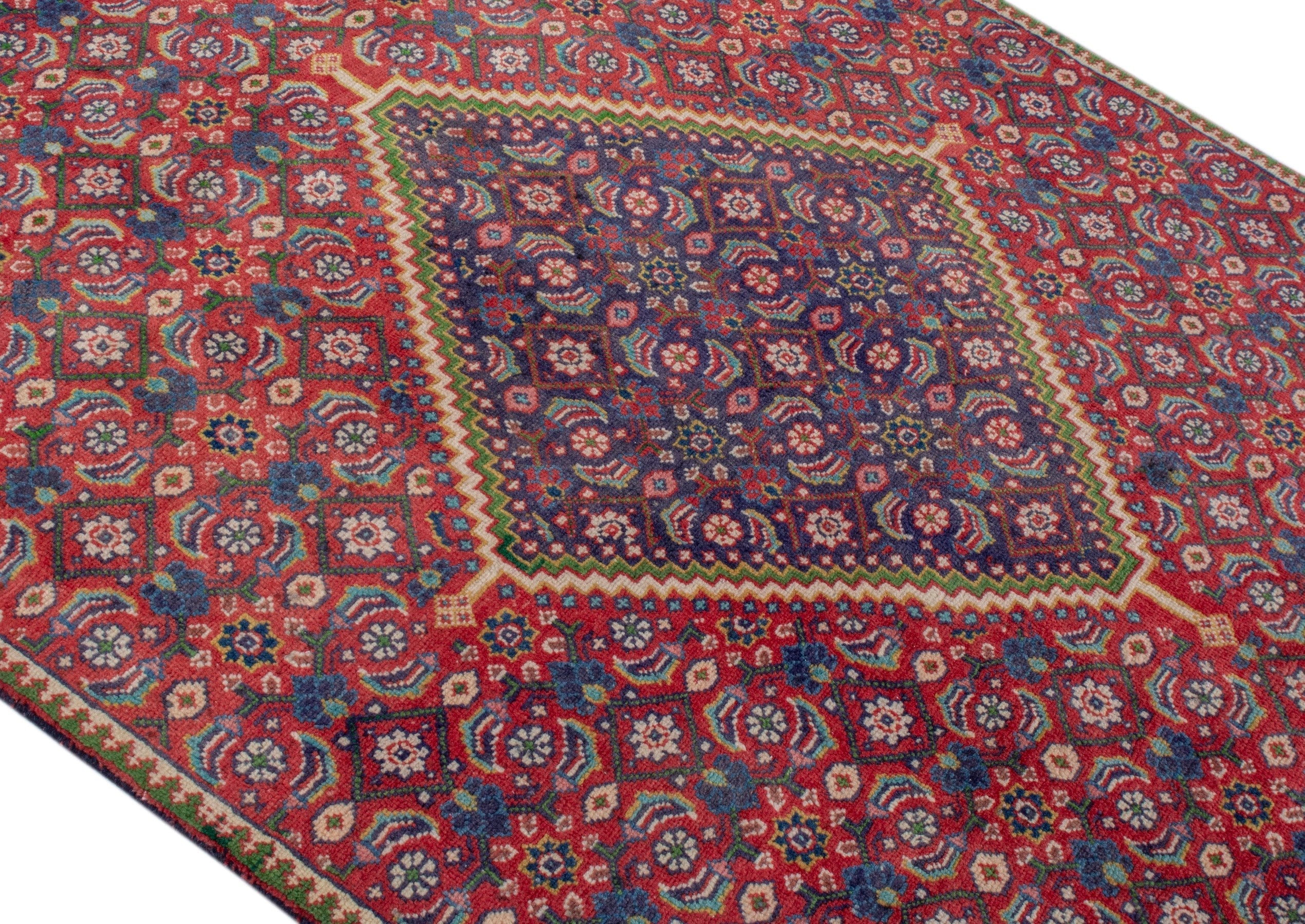 Persian Mahal area rug in rust and plum, view 4 of 19