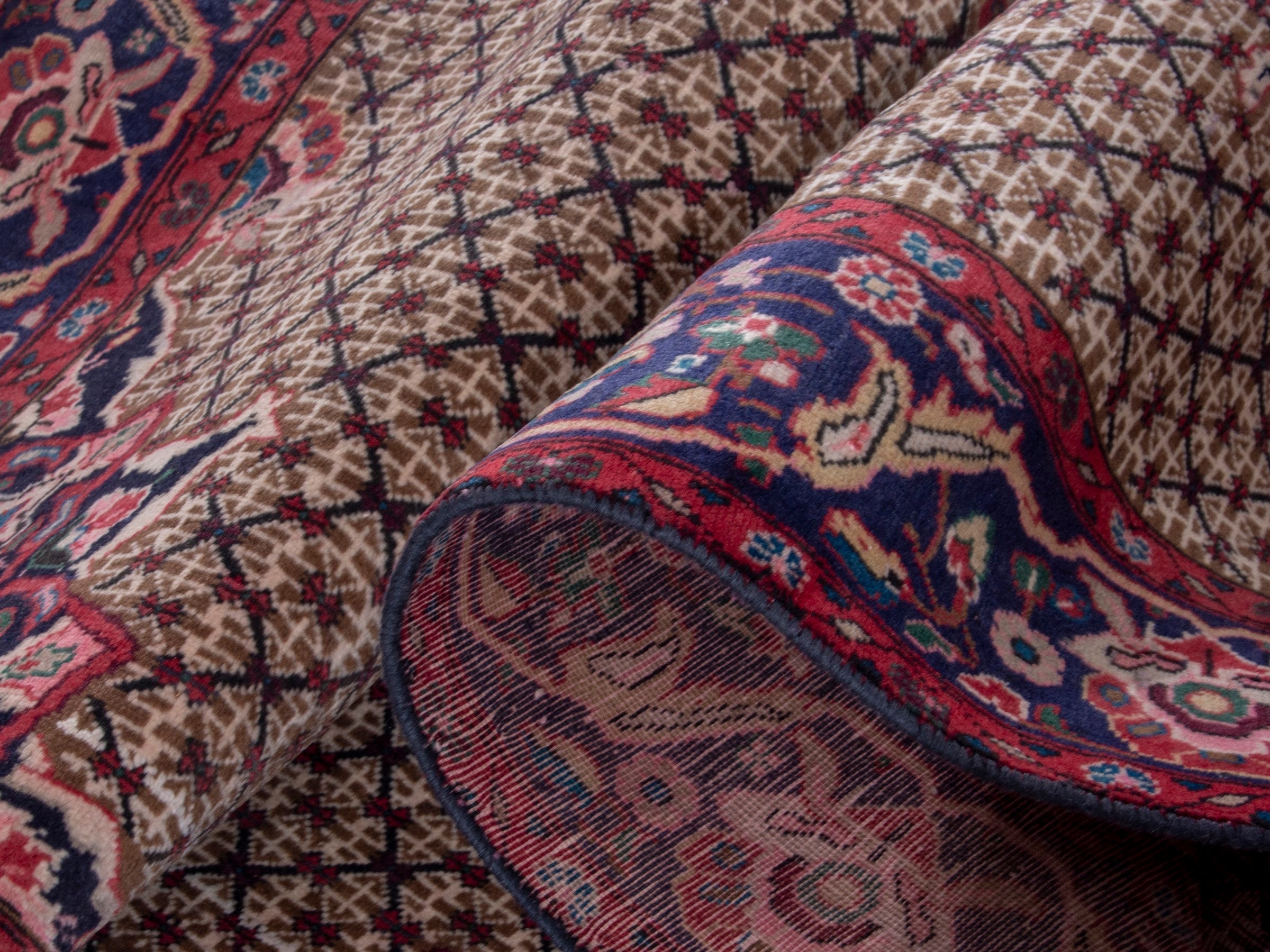 Persian Songhor area rug in cream and burgundy, view 17 of 18