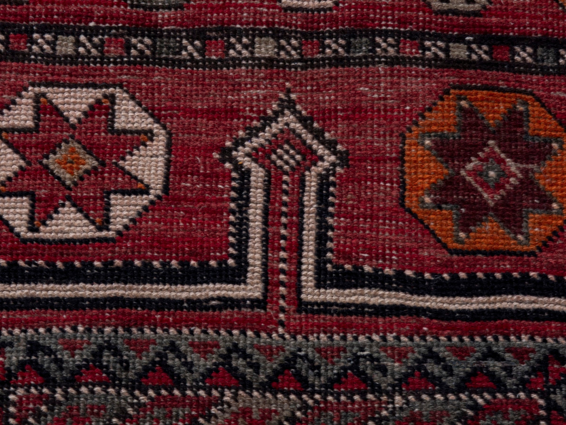 Persian Ghoochan area rug in deep red and rust, view 14 of 19