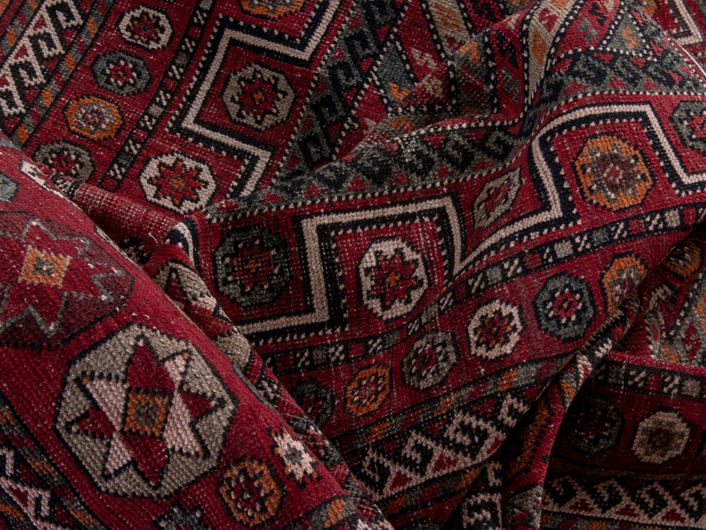 Persian Ghoochan area rug in deep red and rust, view 16 of 19