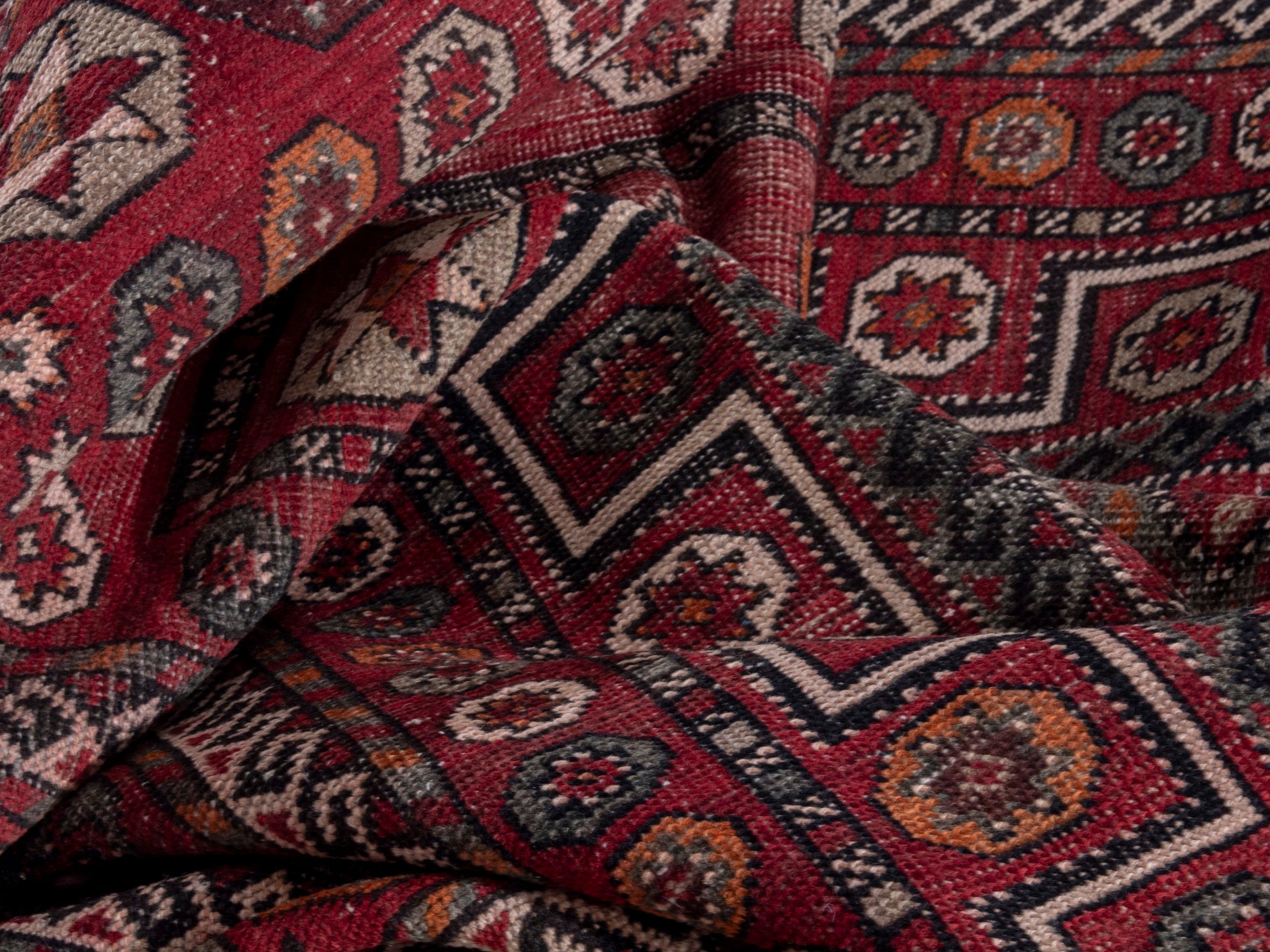 Persian Ghoochan area rug in deep red and rust, view 18 of 19