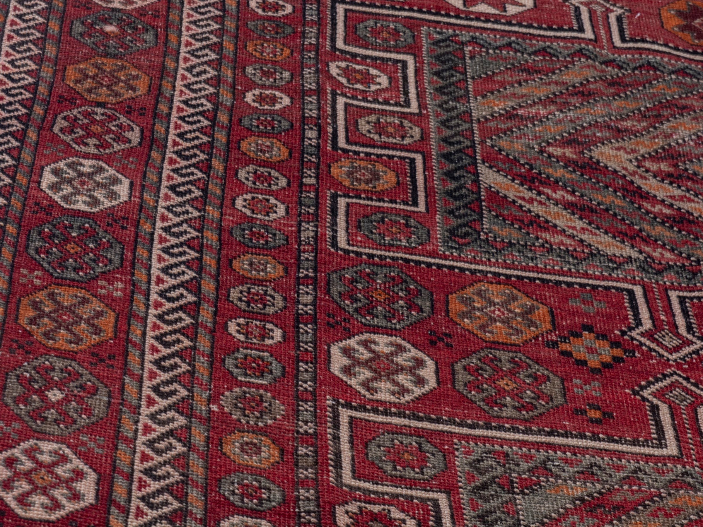 Persian Ghoochan area rug in deep red and rust, view 9 of 19