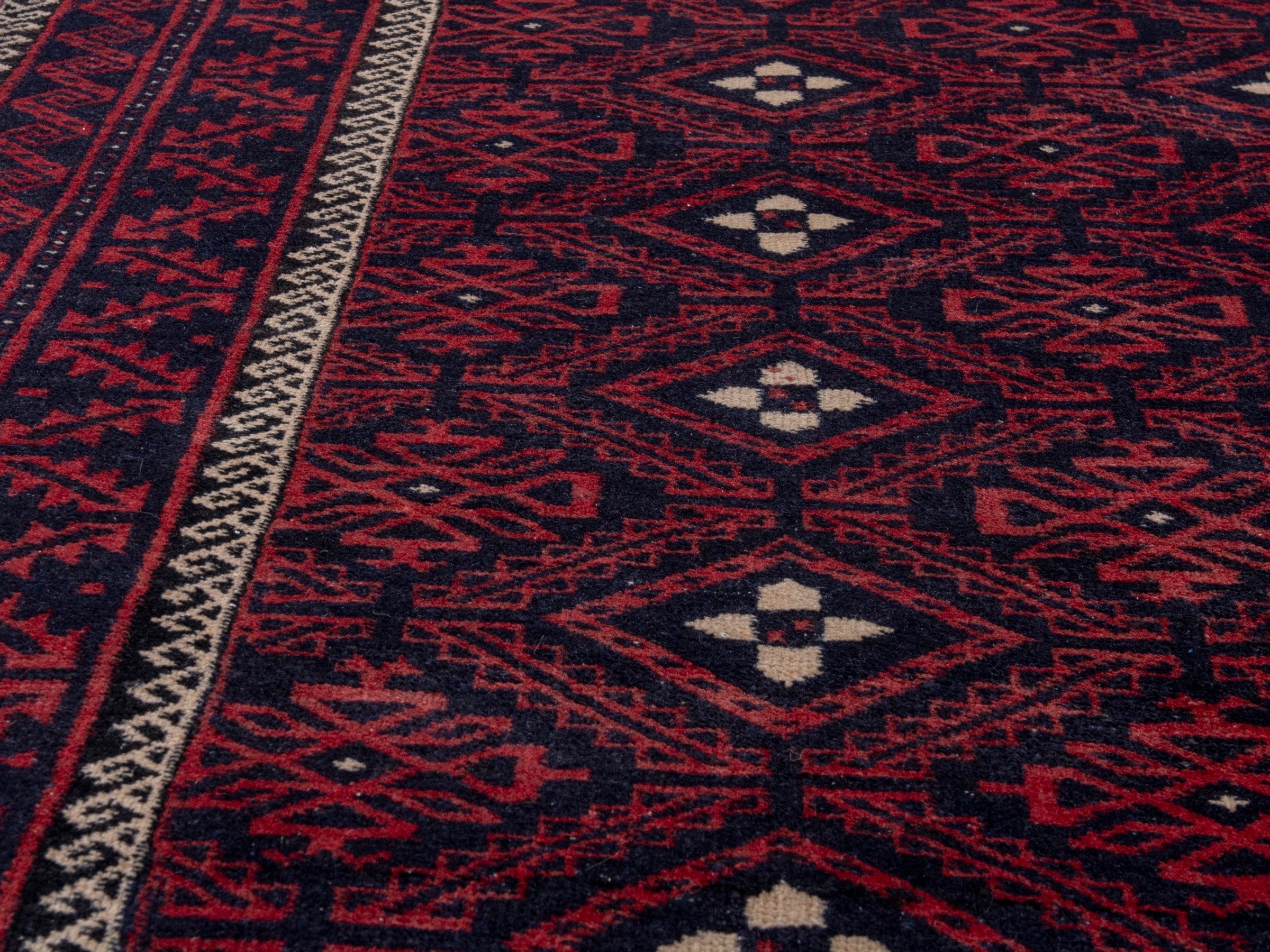 Persian Baluch area rug in burgundy and deep red, view 11 of 19