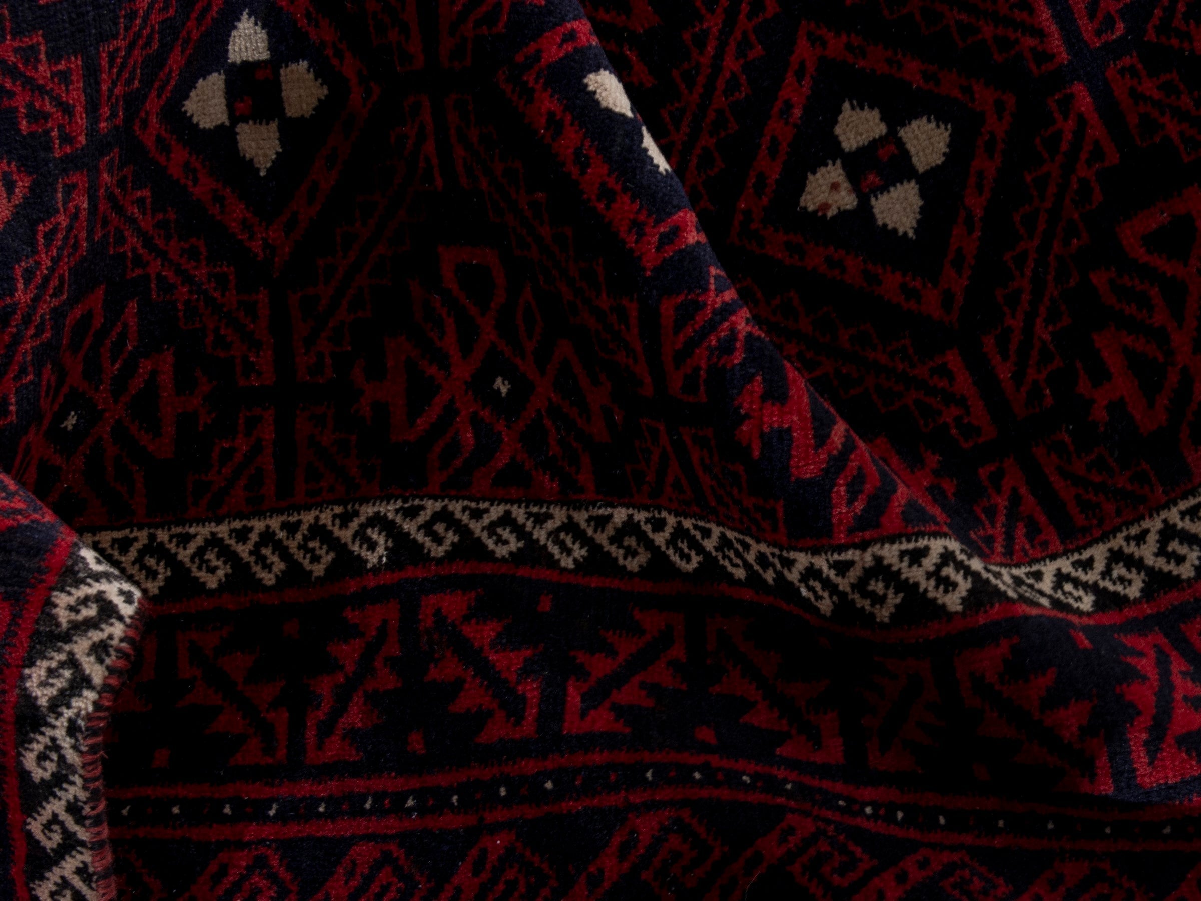 Persian Baluch area rug in burgundy and deep red, view 17 of 19