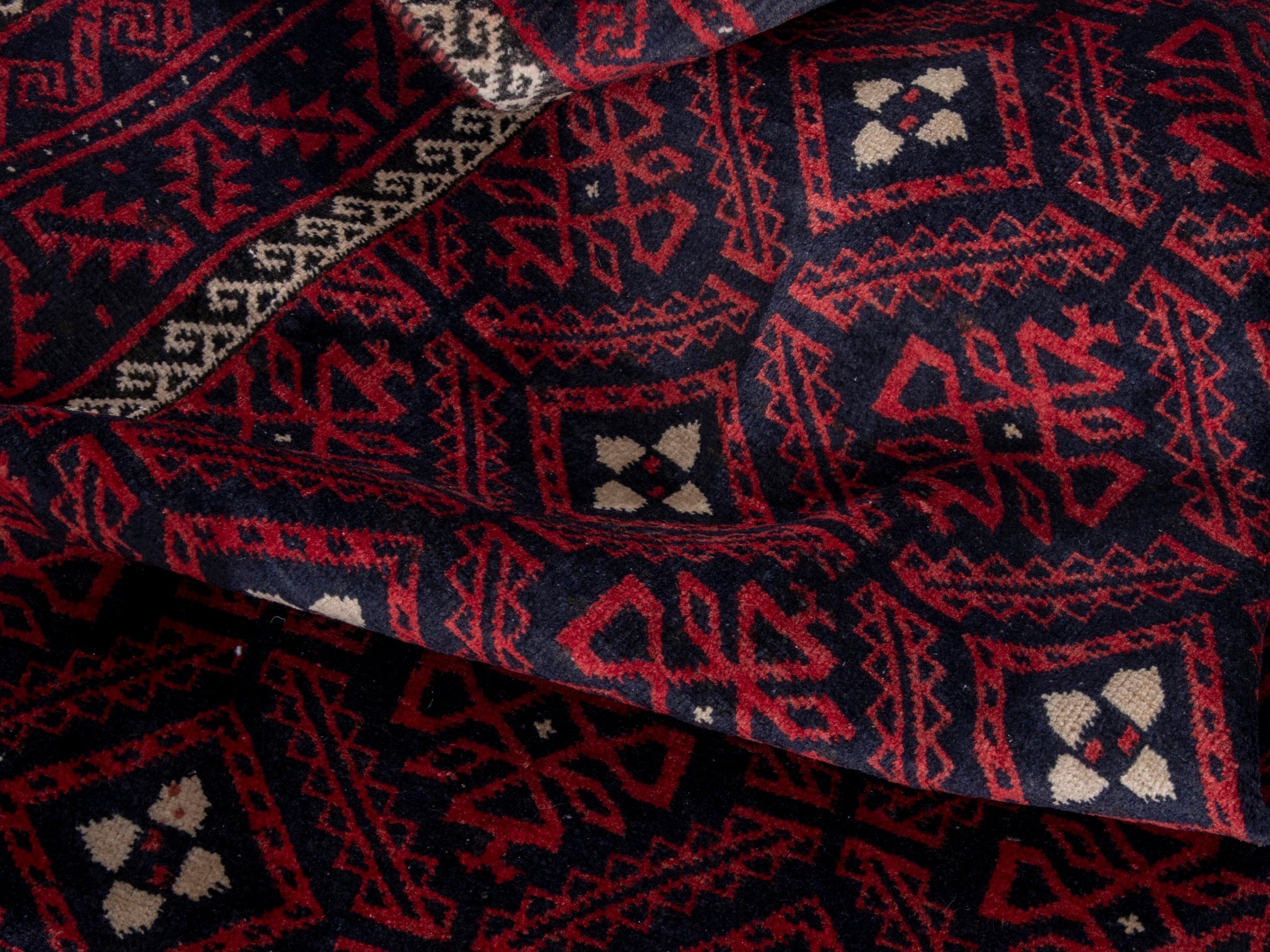 Persian Baluch area rug in burgundy and deep red, view 18 of 19
