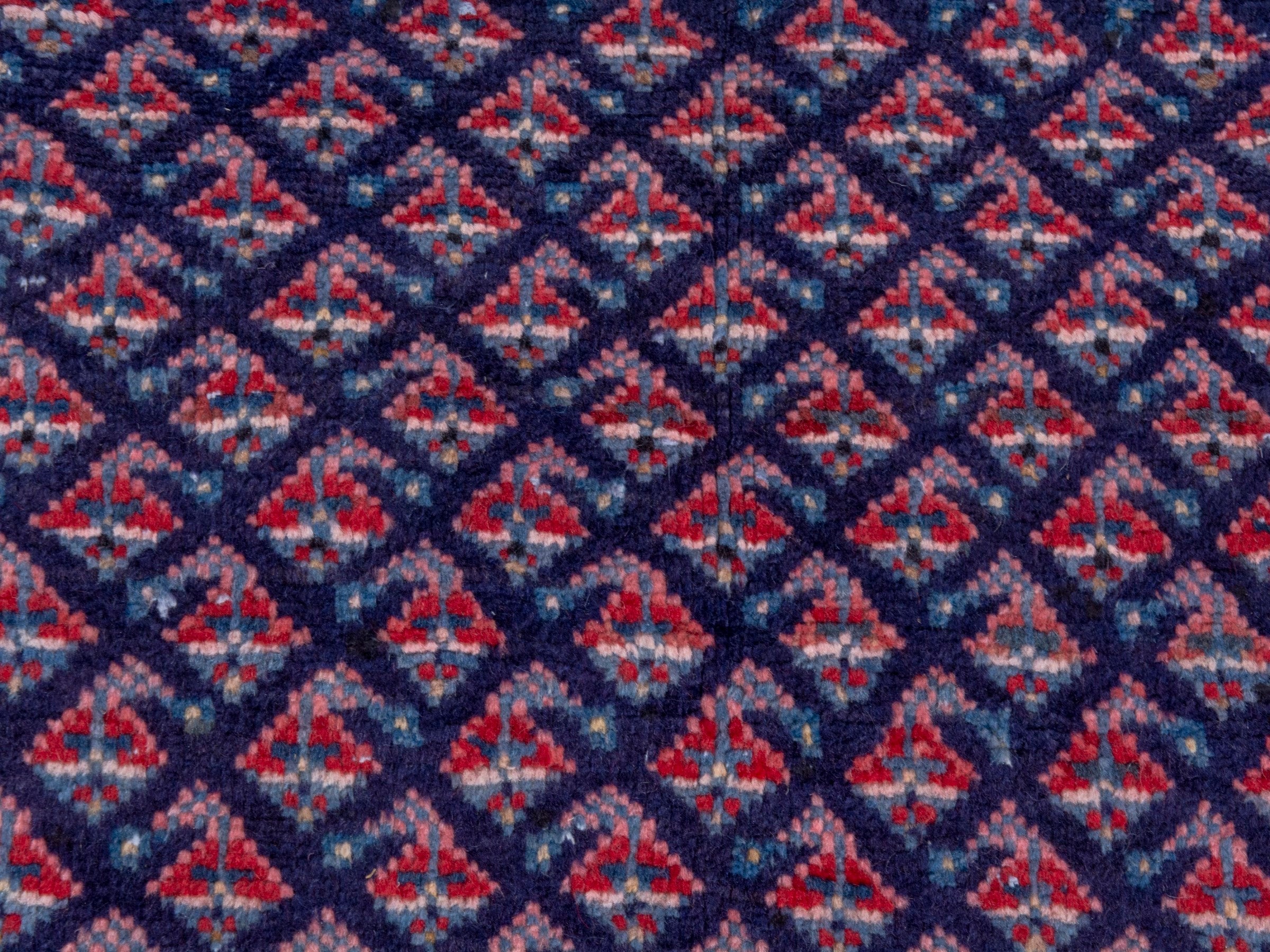 Persian Arak area rug in navy and dusty rose, view 12 of 19