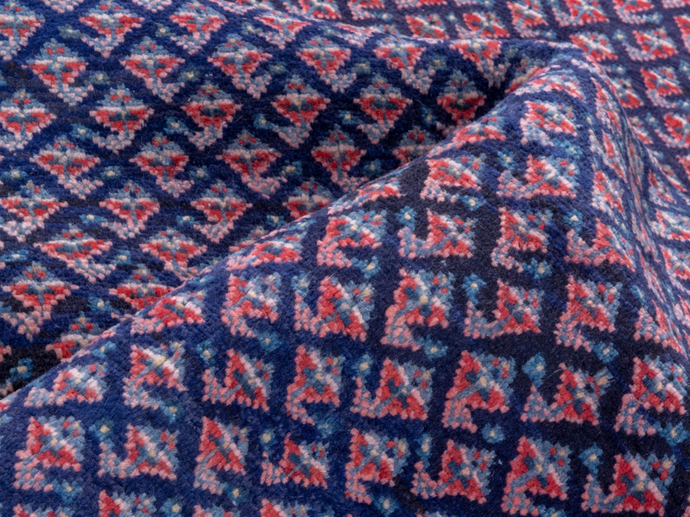 Persian Arak area rug in navy and dusty rose, view 15 of 19