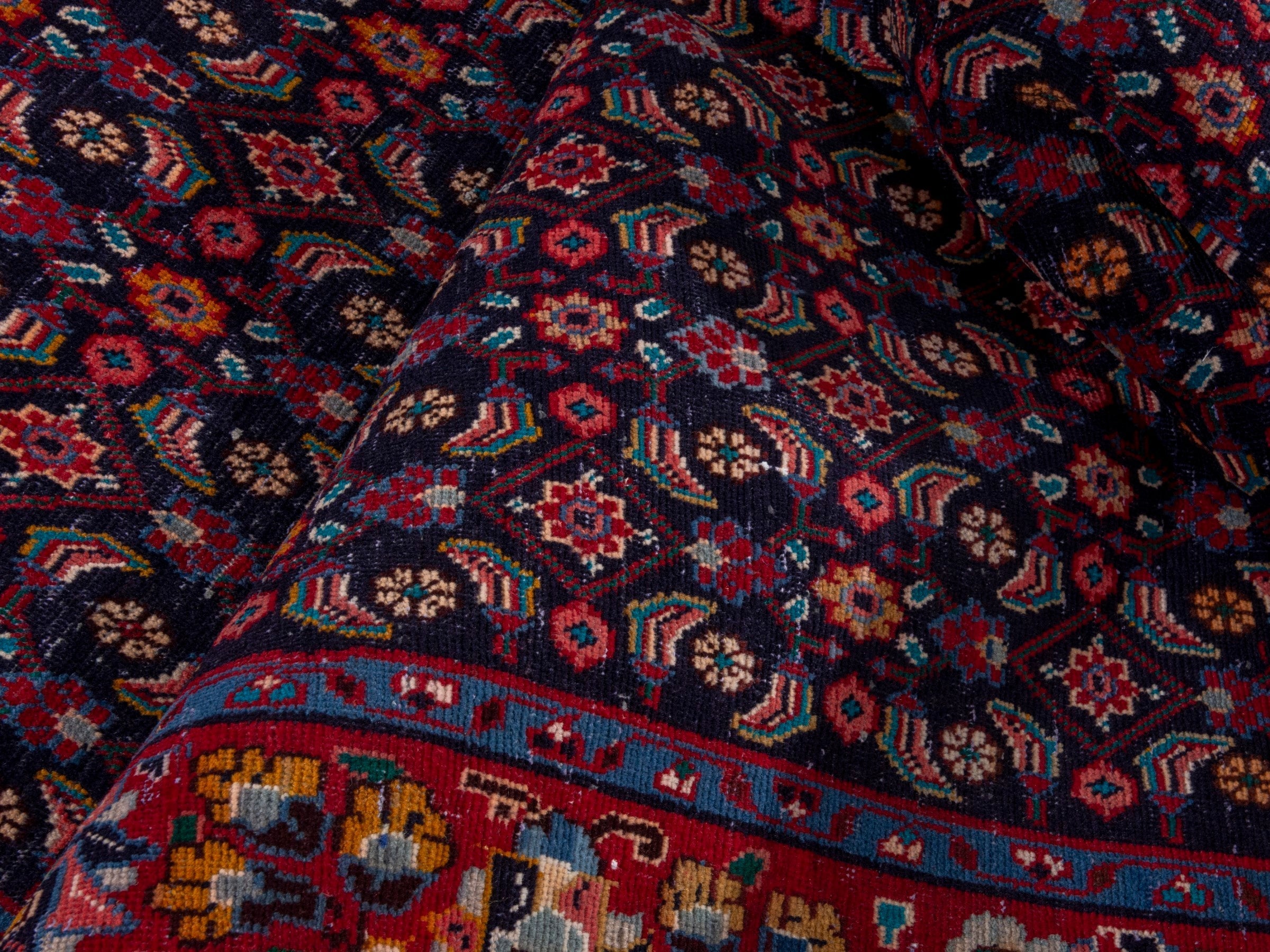 Persian Mahal area rug in navy and deep red, view 18 of 20