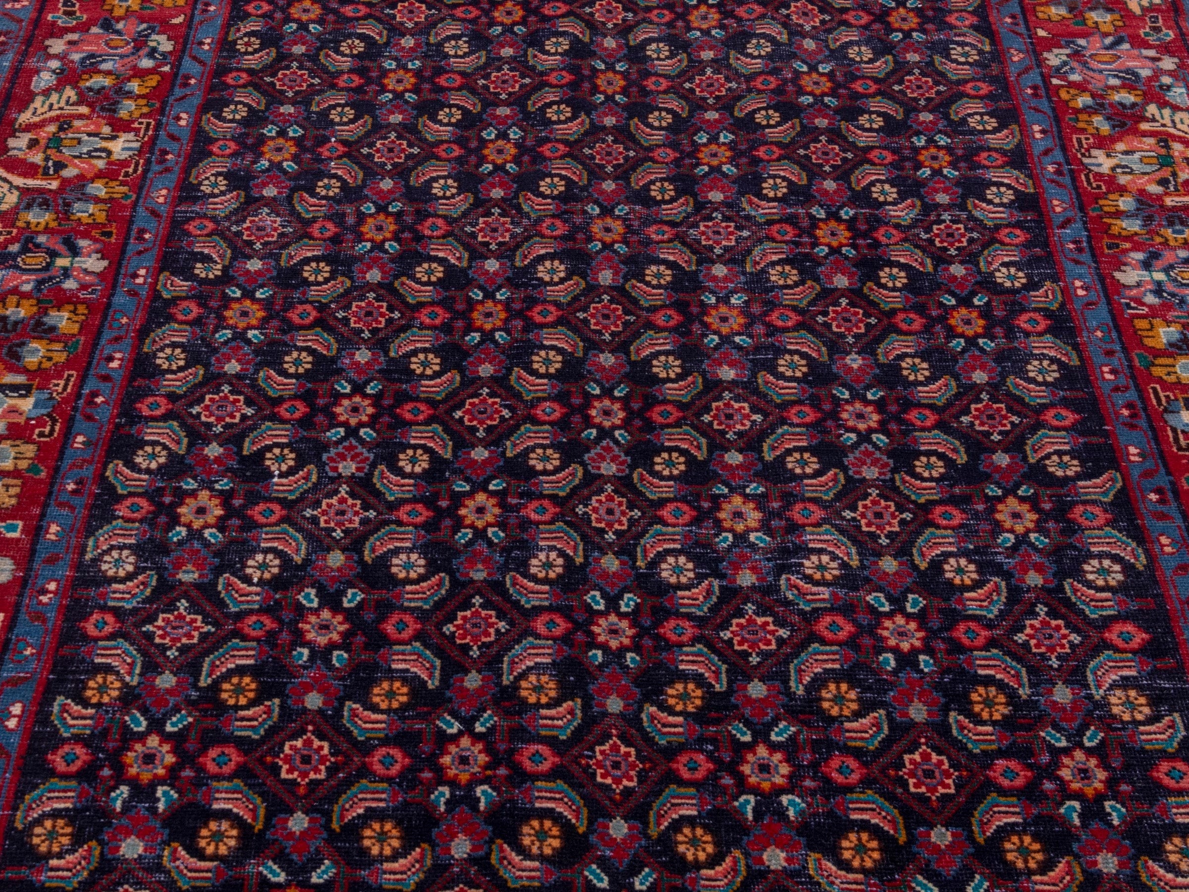 Persian Mahal area rug in navy and deep red, view 7 of 20
