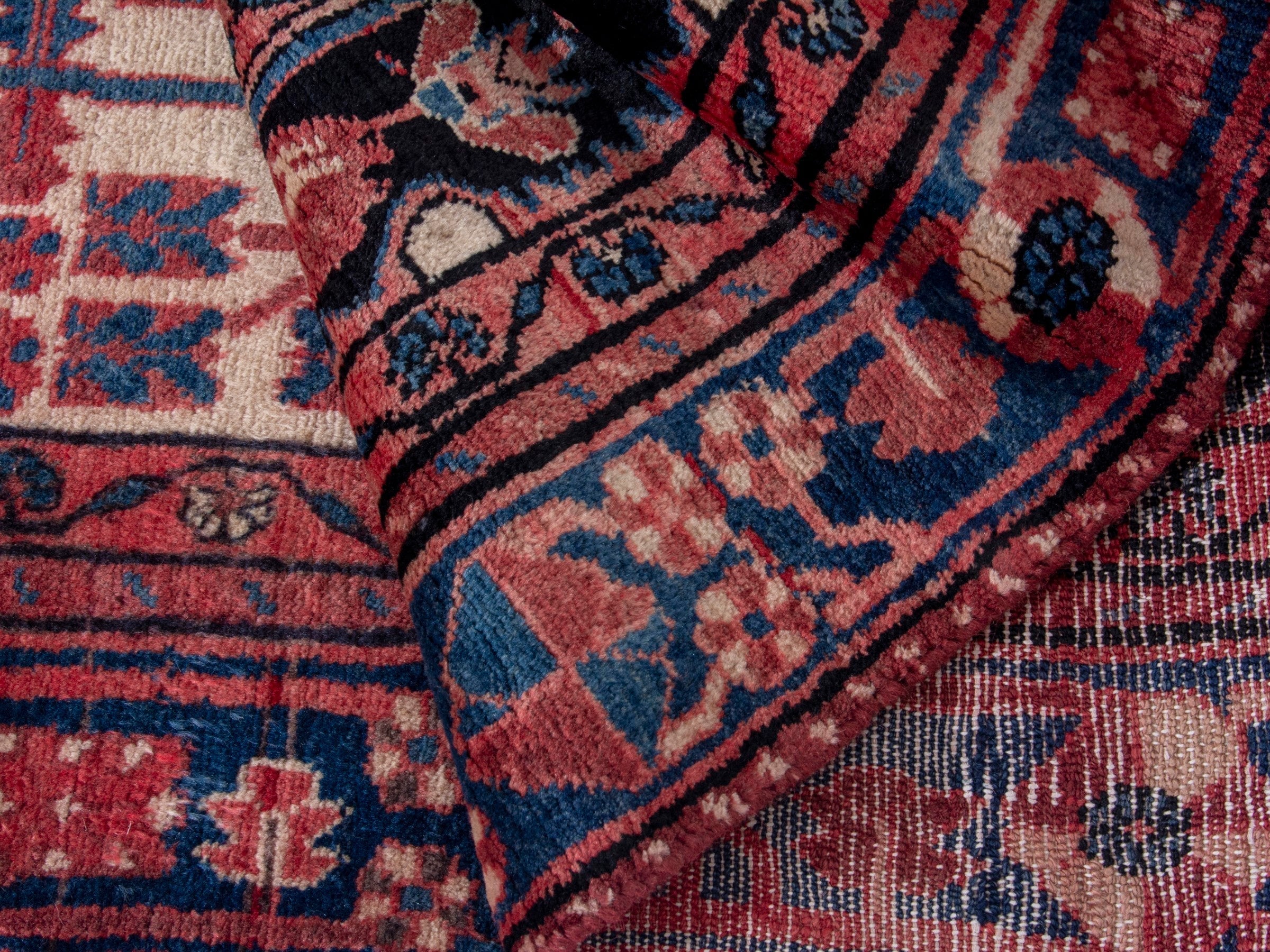 Persian Nahavand area rug in terracotta and dark blue, view 15 of 18
