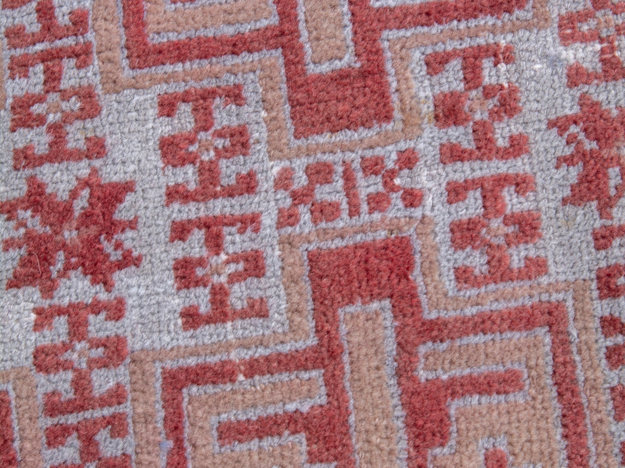 Persian Torkaman accent rug in muted pink and faded red, view 7 of 8