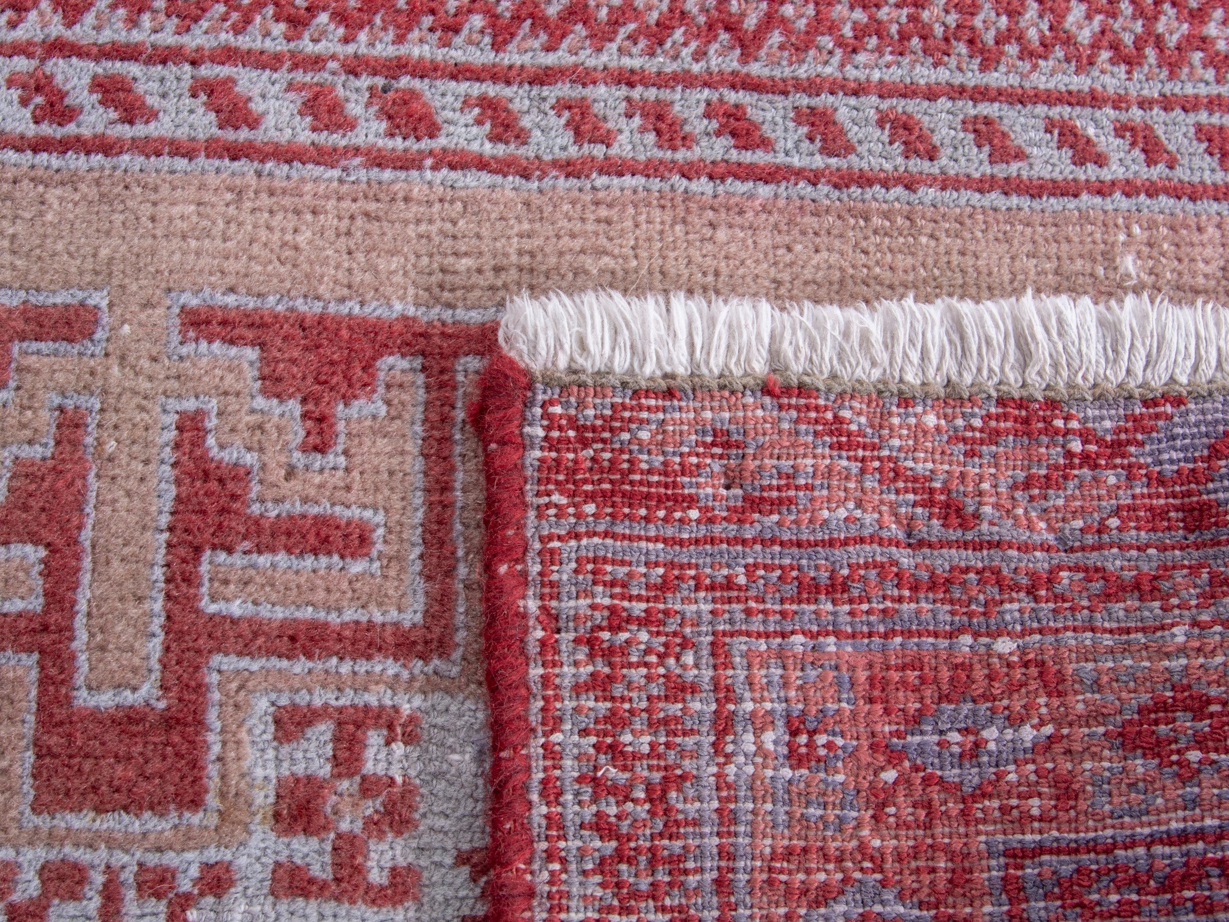 Persian Torkaman accent rug in muted pink and faded red, view 8 of 8