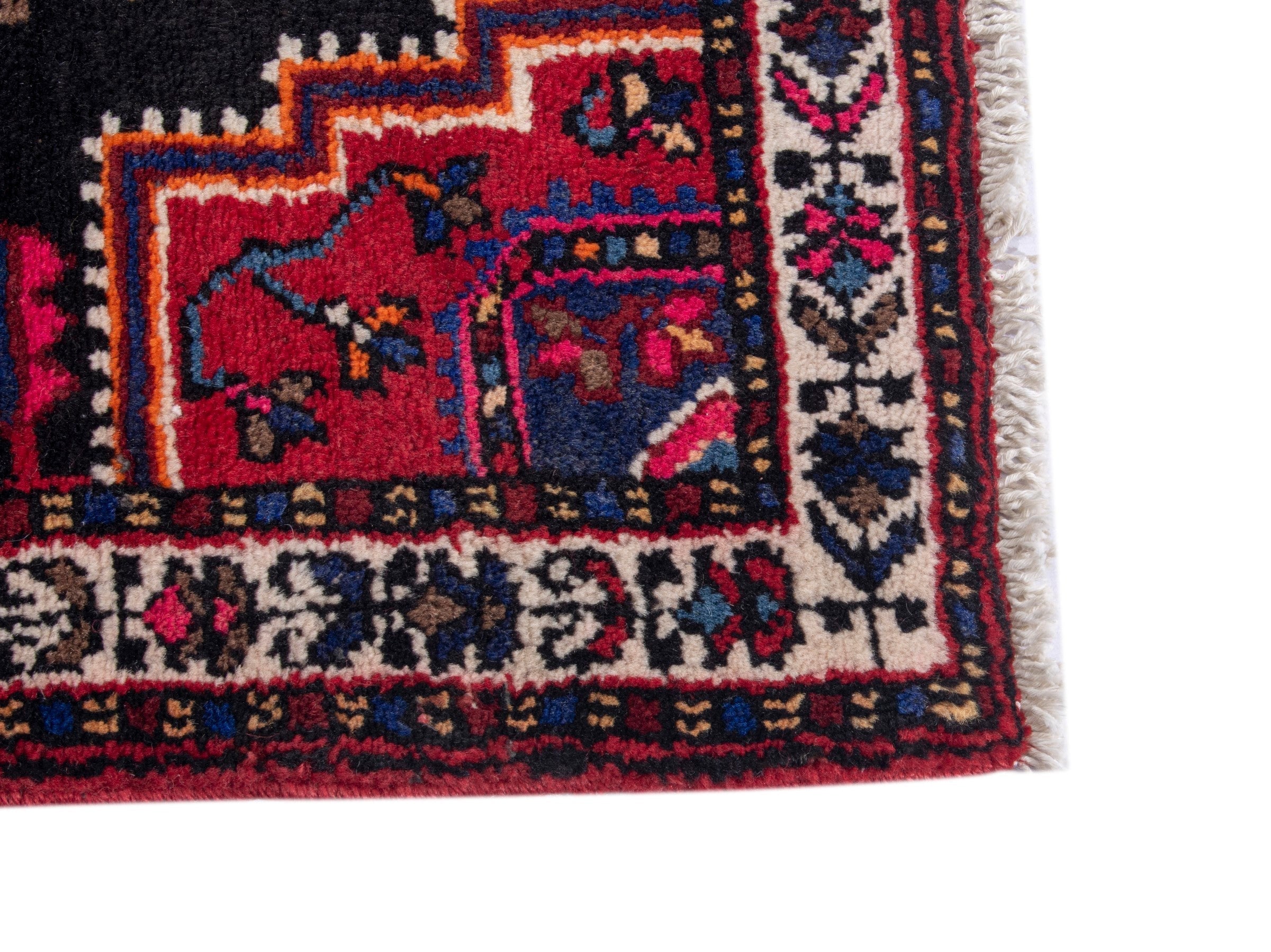 Persian Toyserkan accent rug in black and deep red, view 4 of 8