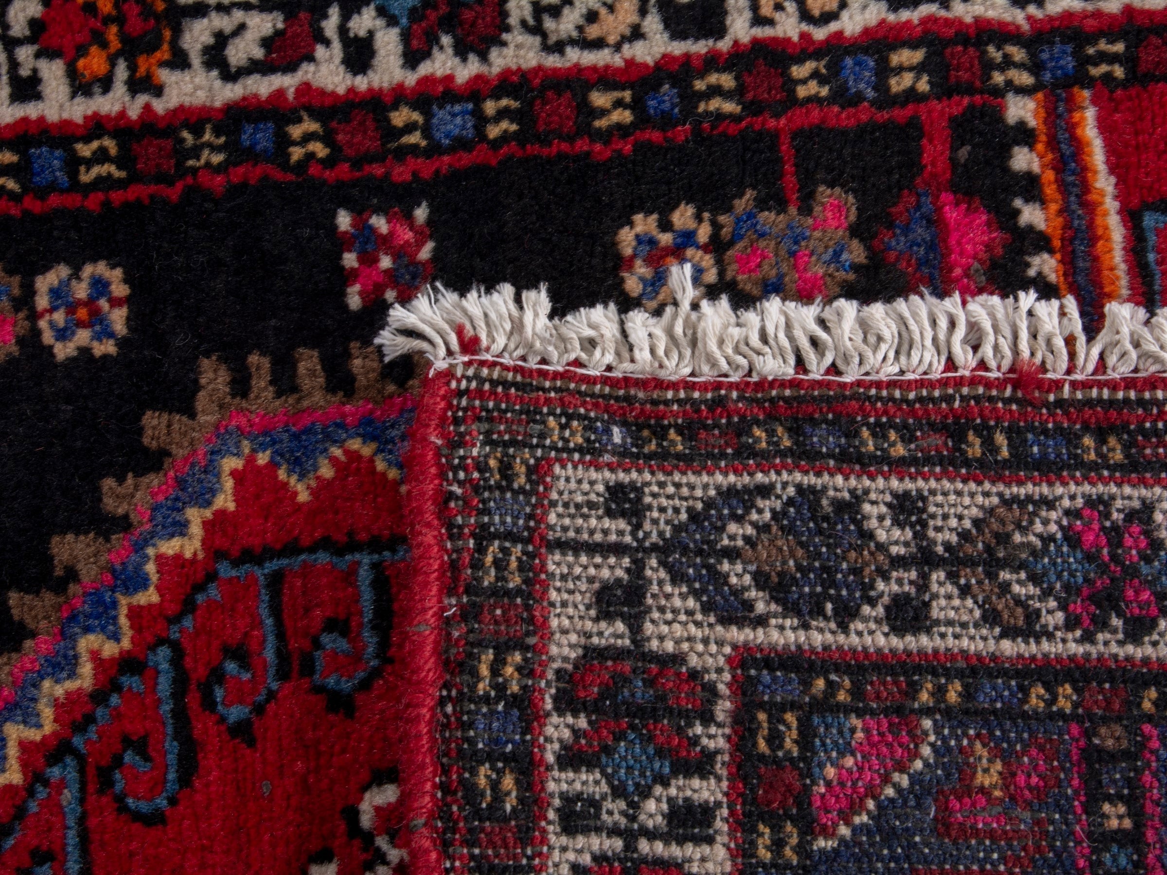 Persian Toyserkan accent rug in black and deep red, view 8 of 8