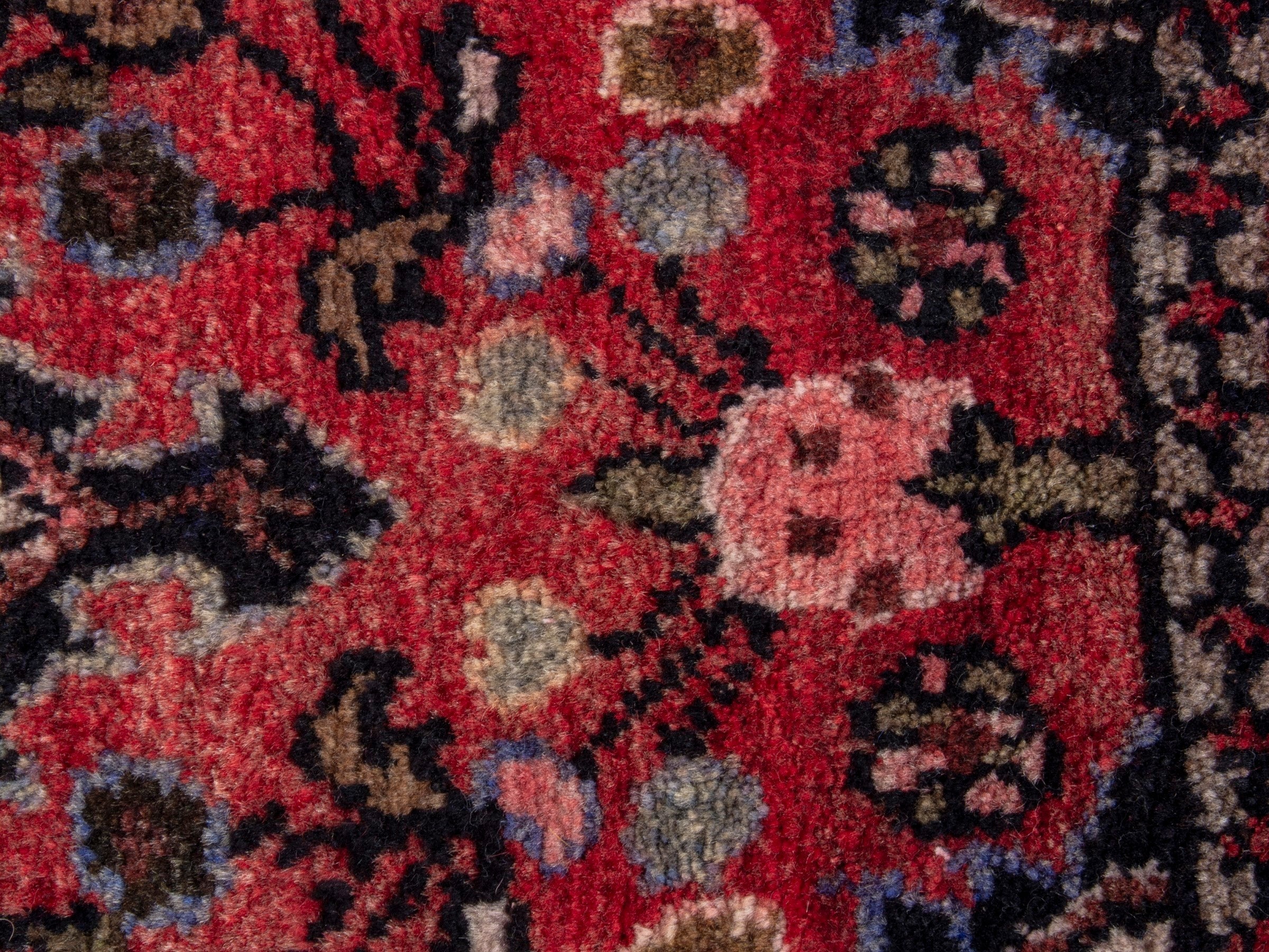 Persian Hamedan accent rug in deep red and navy, view 6 of 8