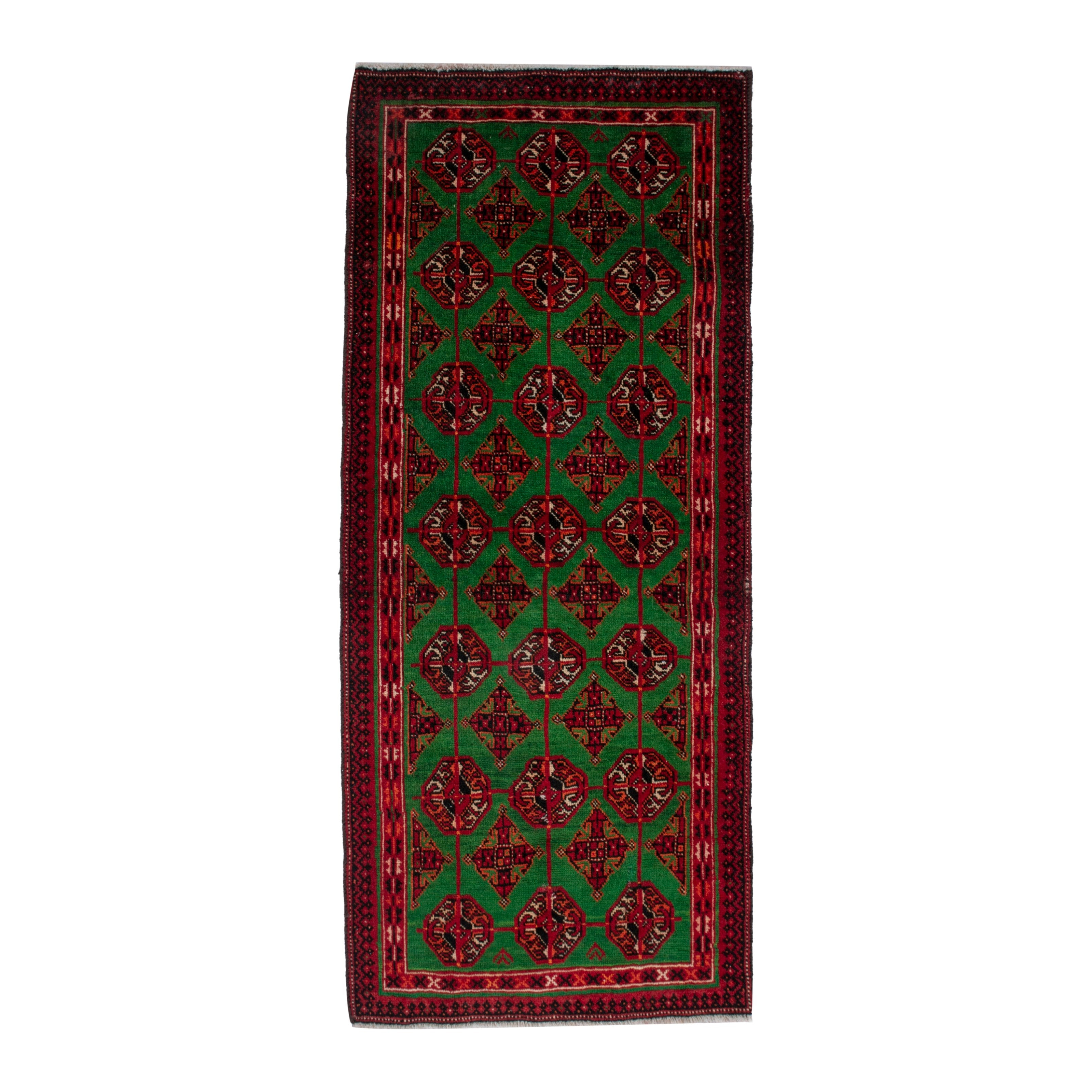 Persian Torkaman accent rug in emerald and deep red, 2'4" x 4'9"